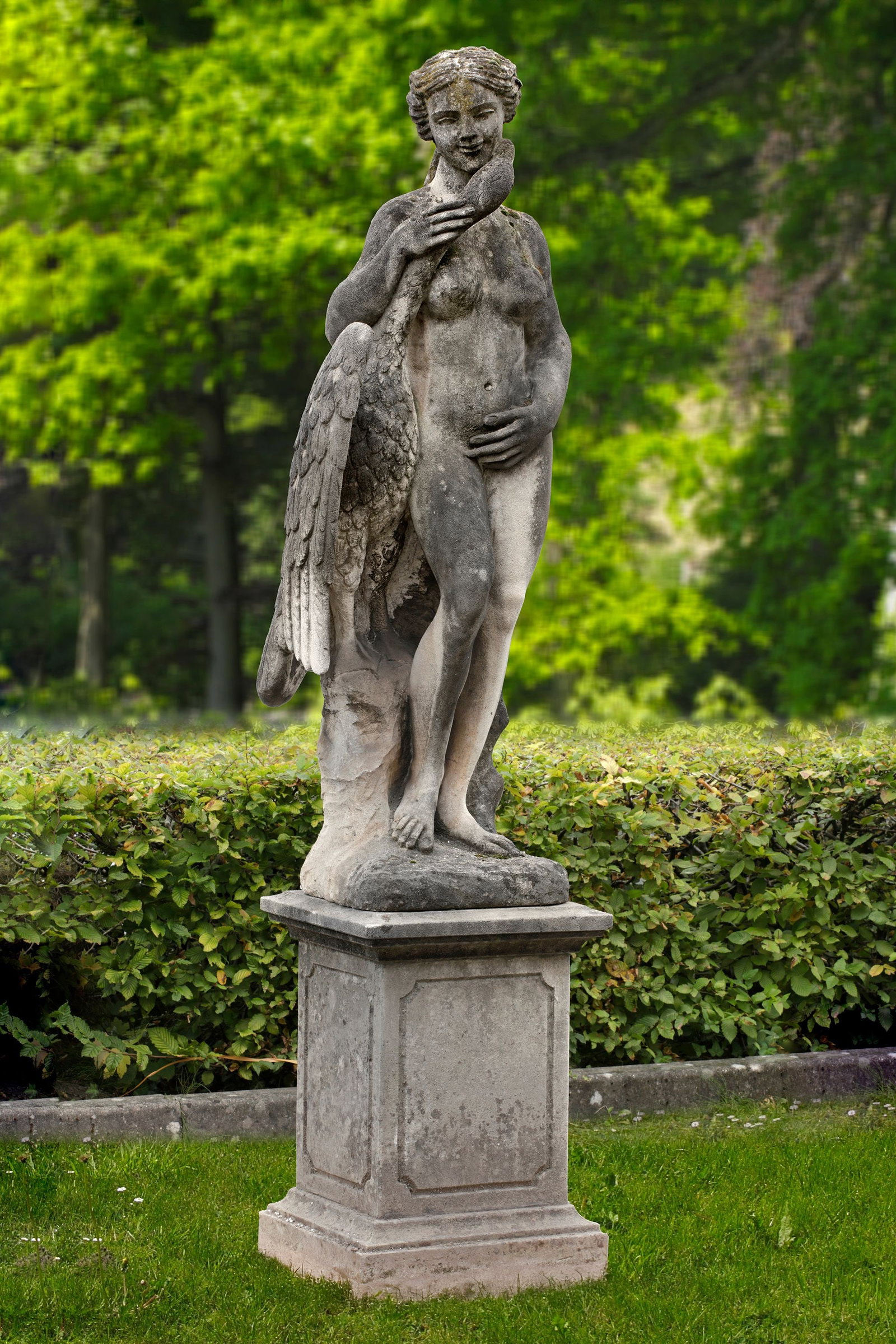 A SCULPTED LIMESTONE GROUP OF LEDA AND THE SWAN, 20TH CENTURY (1 of 1)