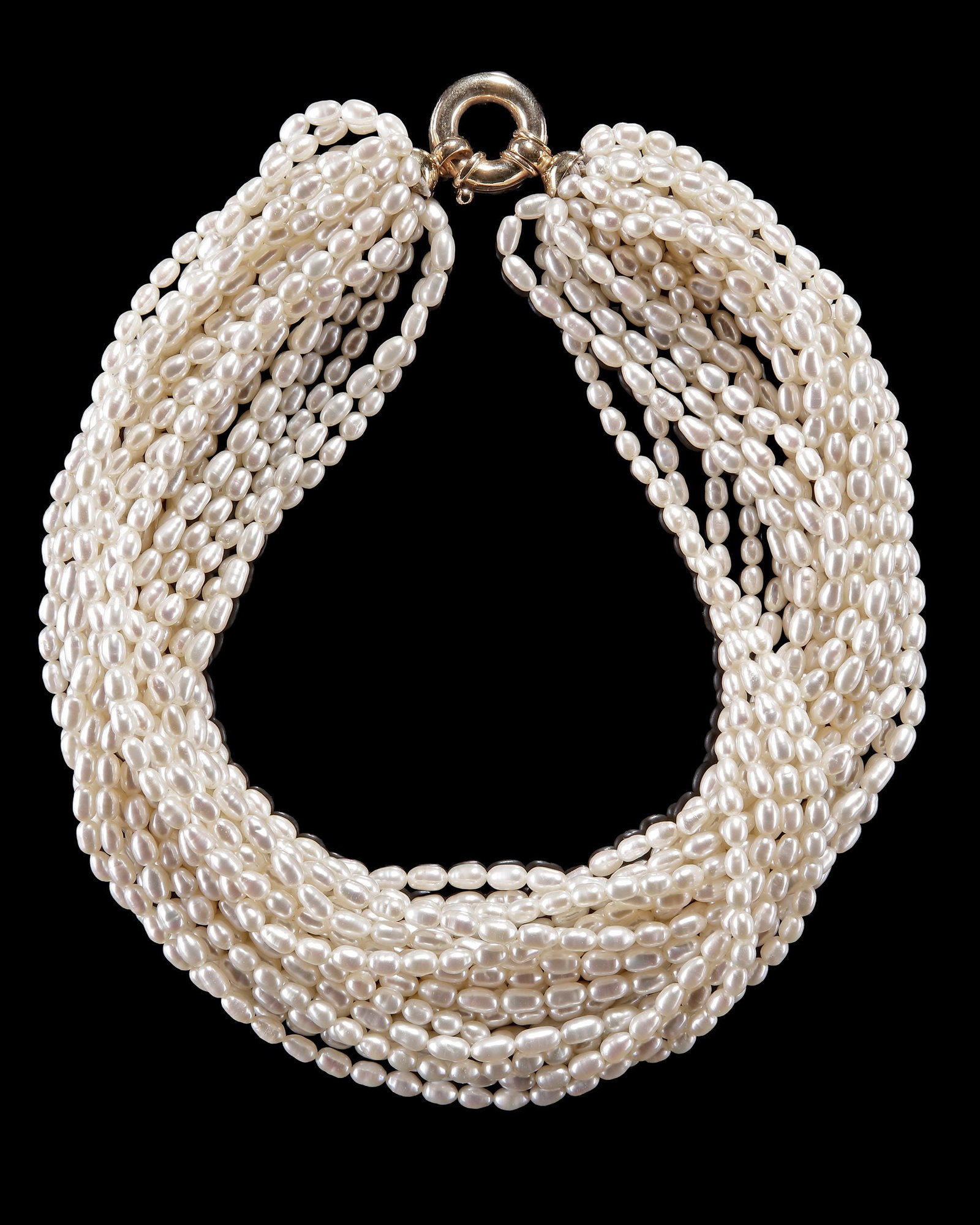 A PEARL NECKLACE: 20 strands of pearls, 14 carat gold lock. Length 42 cm.
