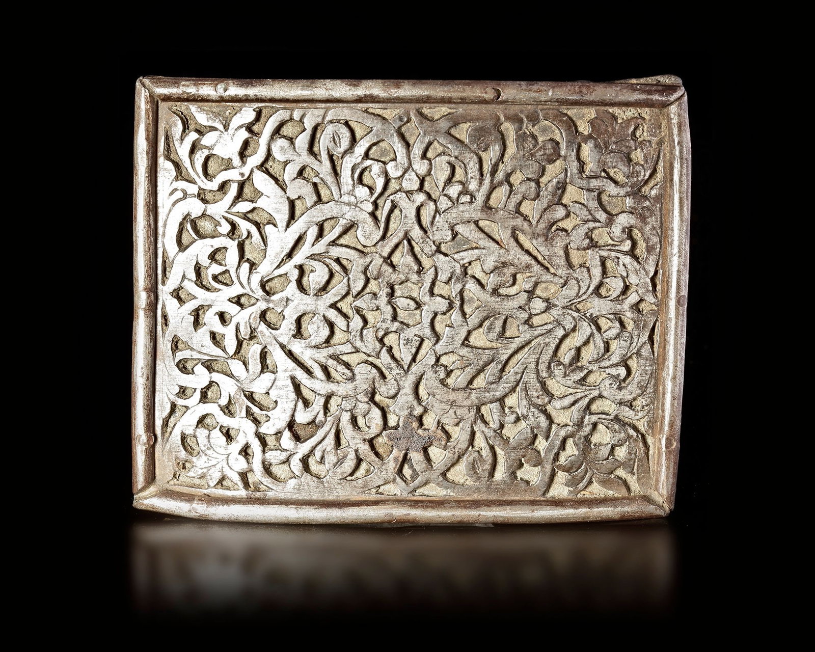 QAJAR OPENWORK PIERCED STEEL BELT BUCKLE, PERSIA, EARLY 19TH CENTURY: 10 by 8 cm. 7 by 6 cm.