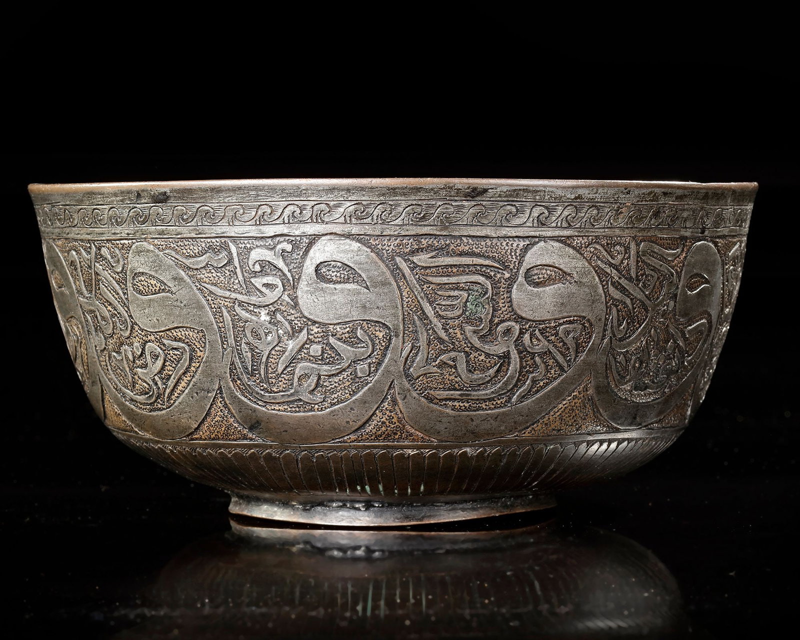 A SAFAVID ENGRAVED COPPER ALLOY BOWL, 17TH CENTURY (1 of 4)