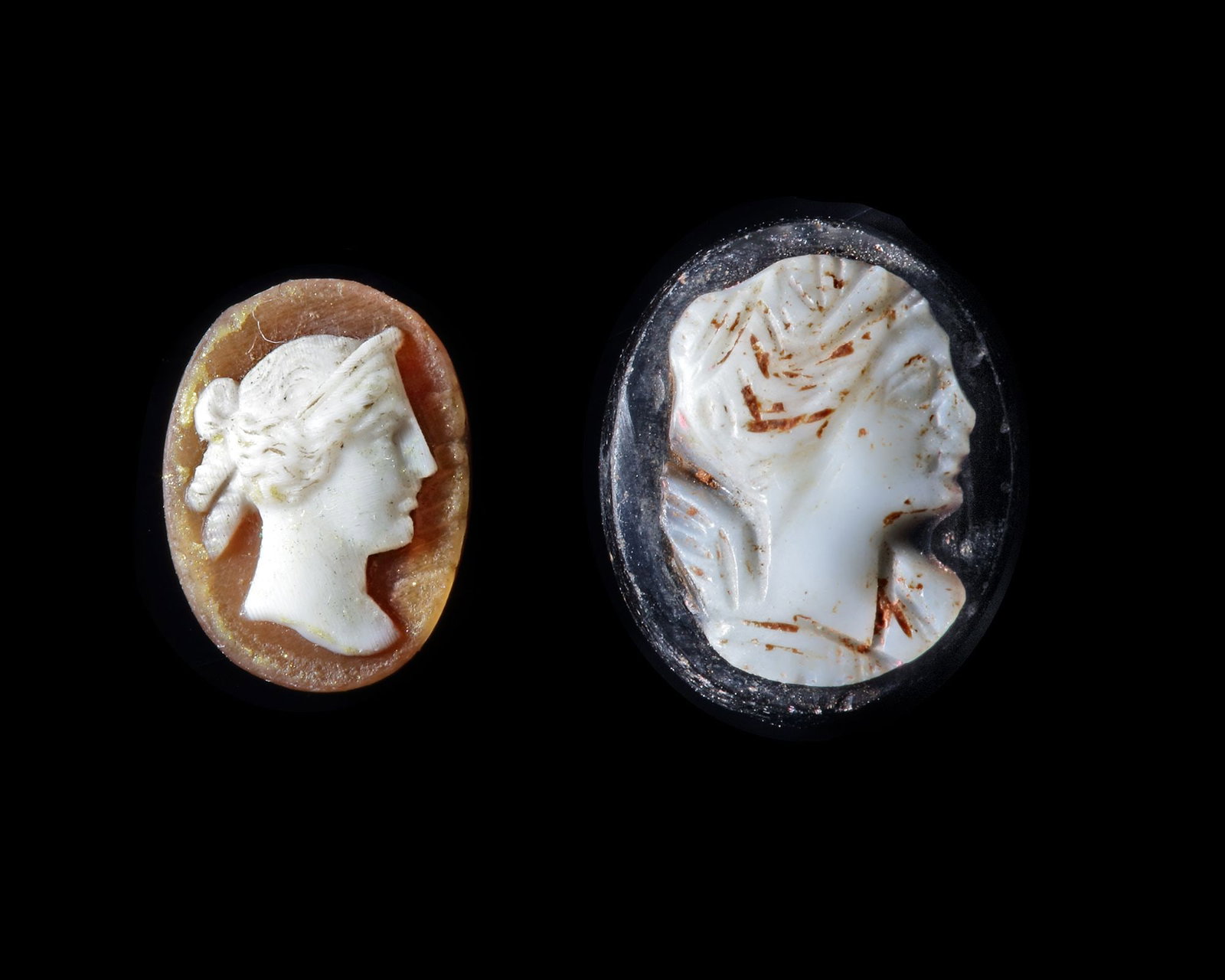 TWO CAMEOS, ROMAN, 1ST CENTURY AD AND 19TH CENTURY AD: One Roman cameo with a bust of Victoria (Victory) facing right in agate. 1st c.A.D. One glass cameo of the Empress Josephine, Napoleonic early 19th.c.A.D 12 mm. and 10 mm. respectively