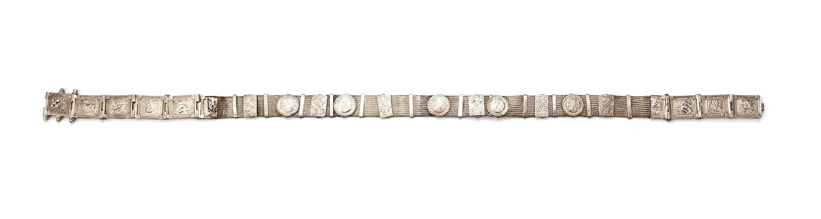 AN OTTOMAN SILVER BELT, 19TH CENTURY: Composed of linked panels finely decorated with intricate motifs and engraved designs. 70 by 2,5 cm. 318 gr. THE DR. SAAD AL-JADIR COLLECTION
