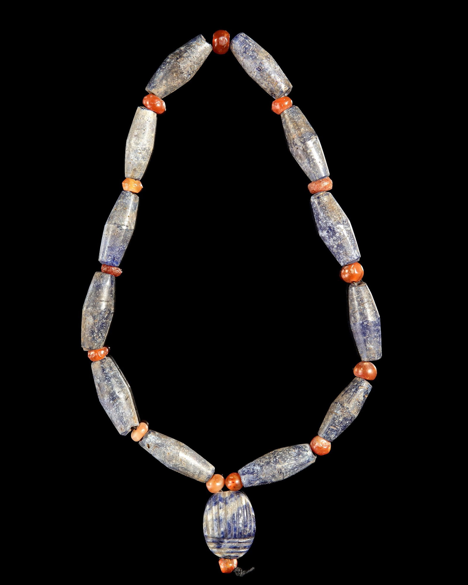 A BLUE GLASS AND CARNELIAN BEAD NECKLACE (1 of 1)