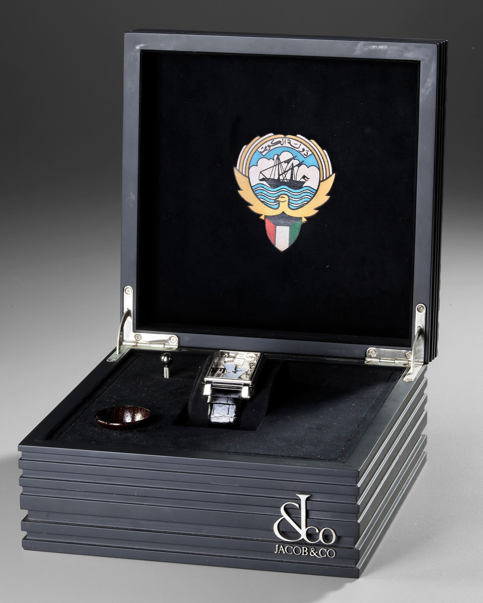 JACOB & CO. EPIC X KUWAIT LIMITED EDITION: A rare Jacob & Co. Epic X Kuwait Limited Edition wristwatch, created in tribute to the State of Kuwait. The distinctive silver dial features a stylized map of Kuwait surrounded by symbolic national mo