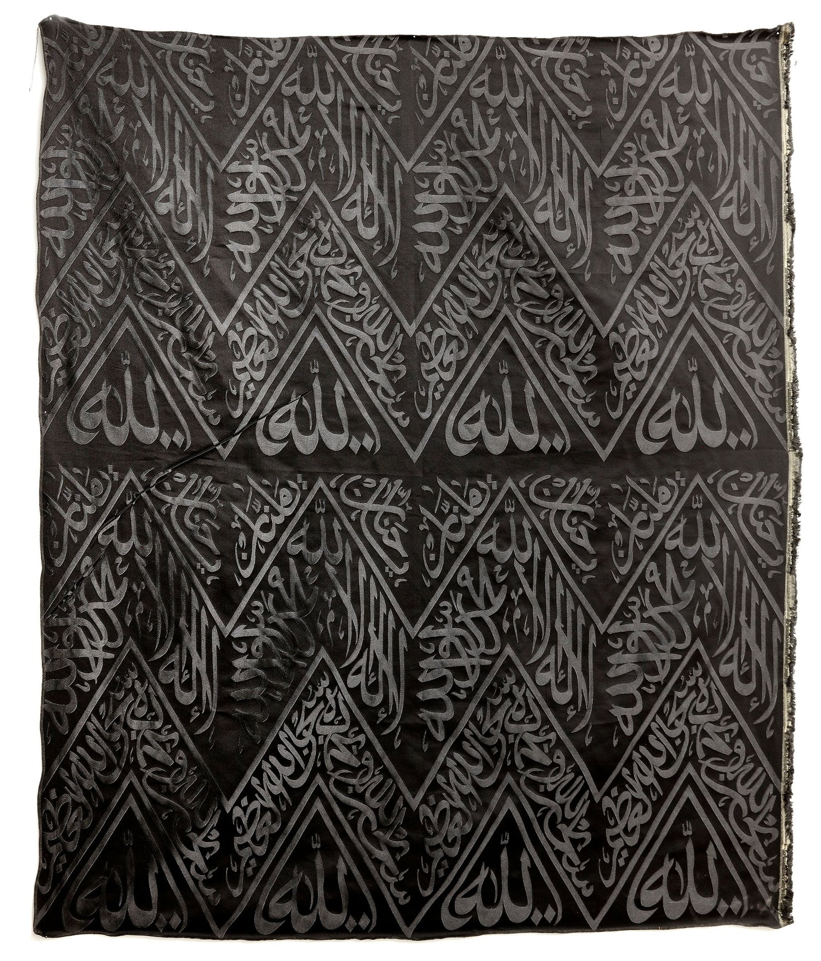 A BLACK KAABA KISWAH TEXTILE FRAGMENT, SAUDI ARABIA, 20TH CENTURY (1 of 1)