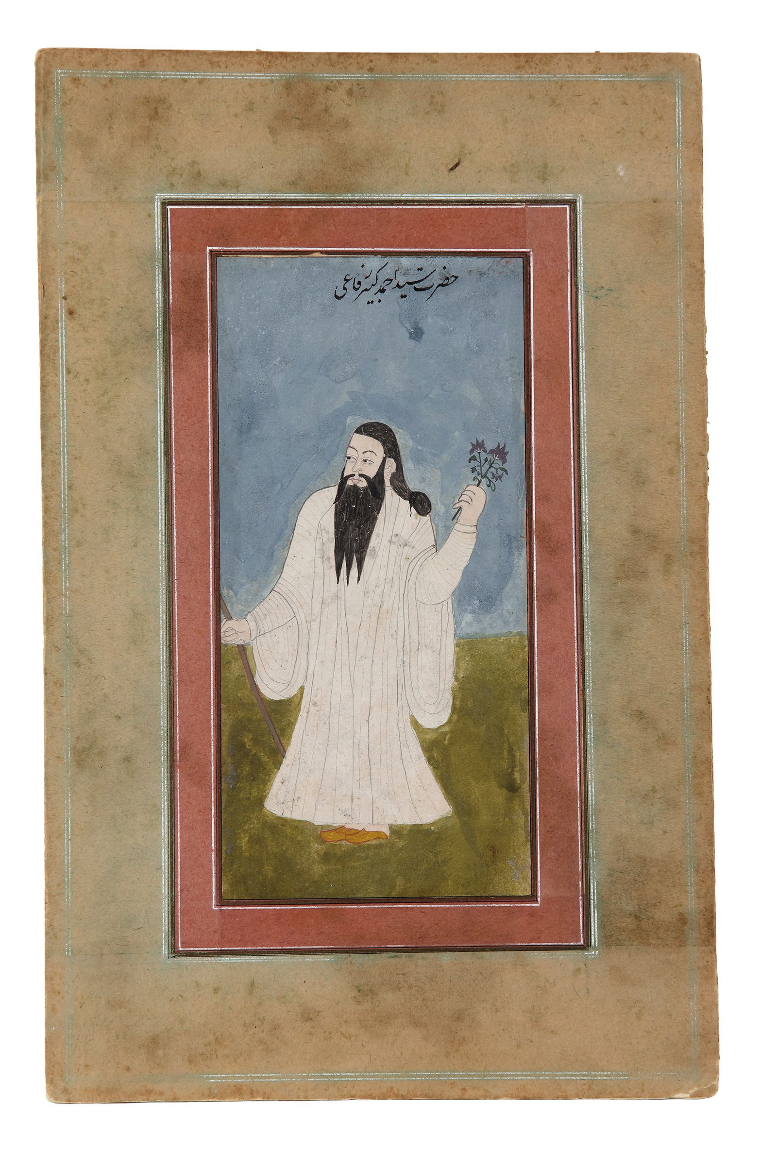AN INDIAN MINIATURE PAINTING, 19TH CENTURY: A delicate Indian miniature depicting a bearded saint or scholar in white robes, holding a flower and staff, set against a serene blue background. 30 by 19 cm.