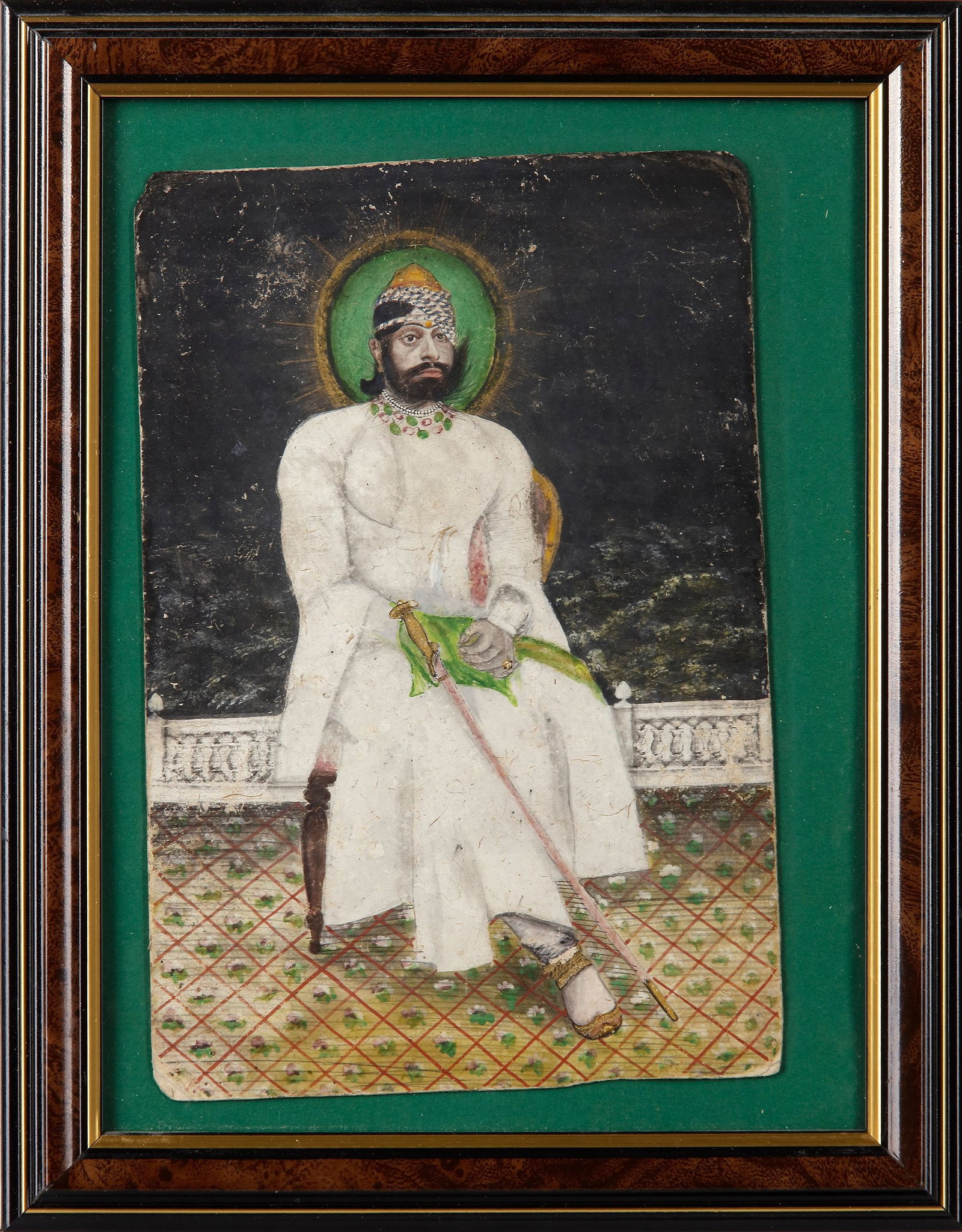 A PORTRAIT OF MAHARAJA JASWANT JI II OF JODHPUR, JODHPUR RAJASTHAN, LATE 19TH CENTURY: Gouache colour heightened with gold on paper. Painting 14 by 21 cm. With frame 22 by 26 cm.