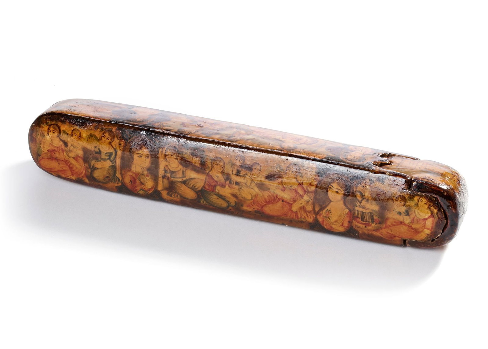 A QAJAR LACQUERED PAPIER-MACH?‰ PEN CASE (QALAMDAN), 19TH CENTURY: Of elongated oval form with sliding drawer, decorated in gilt and polychrome, the top and the sides depicting portraits of a royal family in a landscape, an European-style castle in the background, th