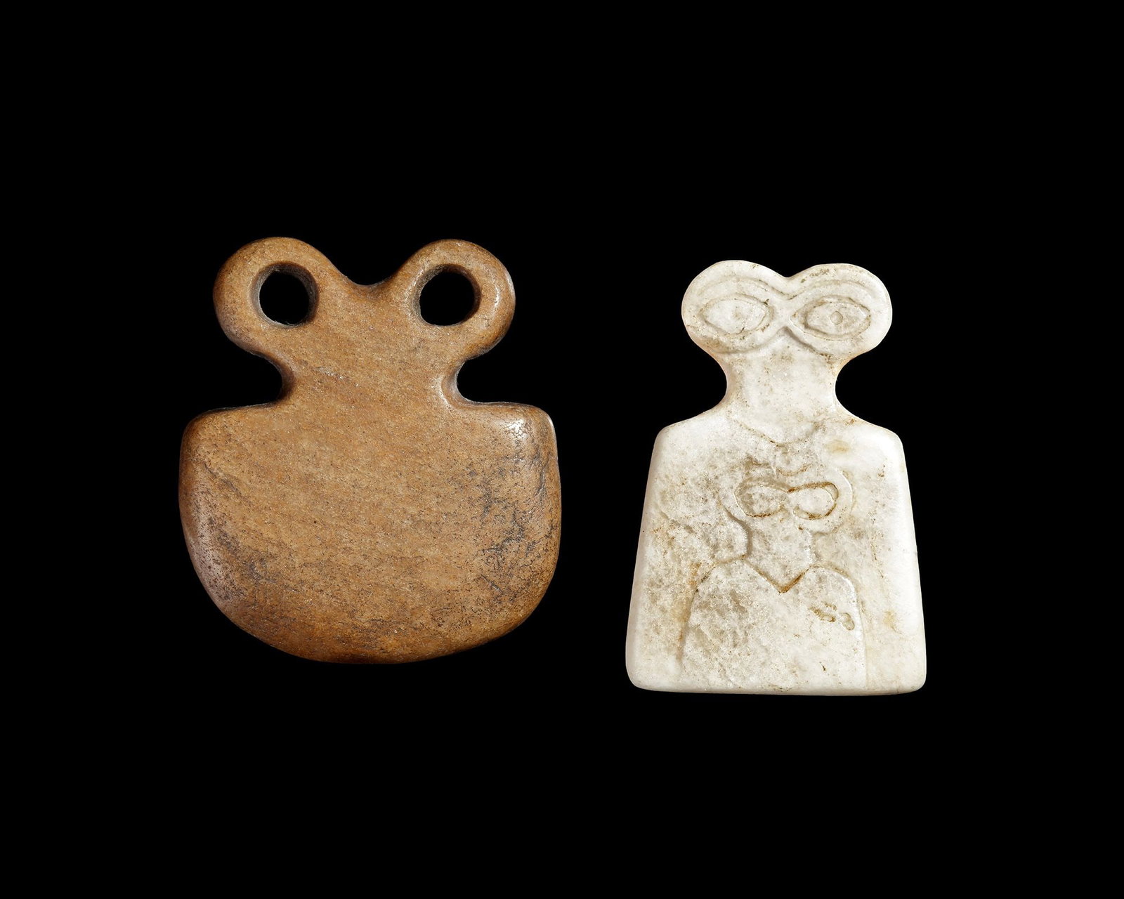 A PAIR OF NEAR EASTERN CALCITE EYE IDOLS, 3RD MILLENNIUM BC (1 of 2)