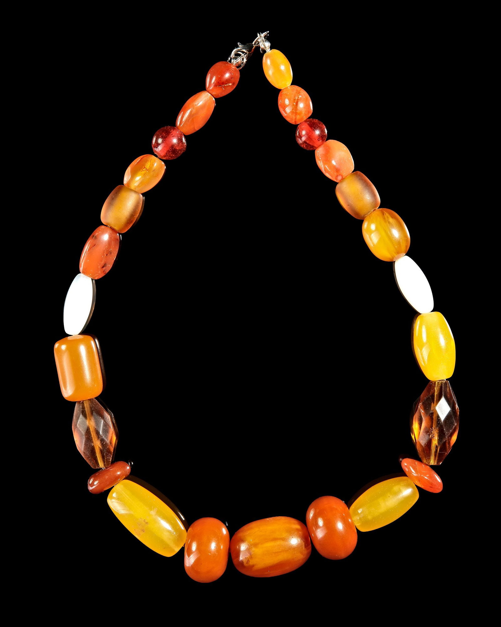 A MULTI-COLOR BEADED STATEMENT NECKLACE: Elegant handcrafted necklace featuring 25 polished beads in warm honey, amber, orange, and red tones. The mix of smooth oval, faceted, and accent beads creates a bold, timeless design that complements