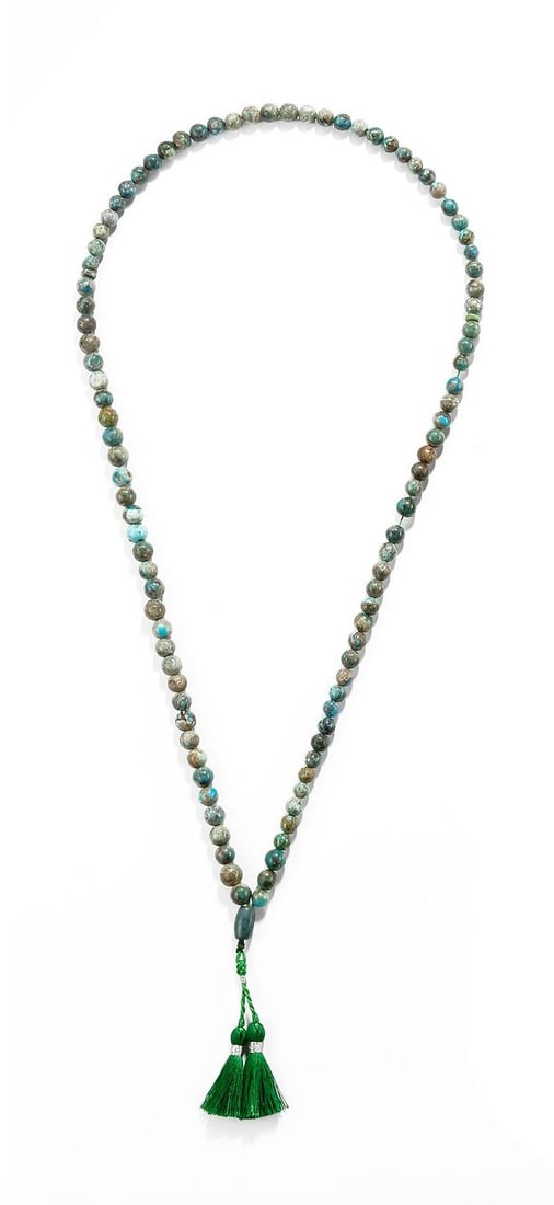 A NATURAL TURQUOISE TASBIH (MISBAHA): A 99 beads Tabish. Crafted with polished natural turquoise gemstone beads and finished with a green double tassel. Ideal for daily dhikr, prayer, or as a meaningful gift. Length 49 cm.