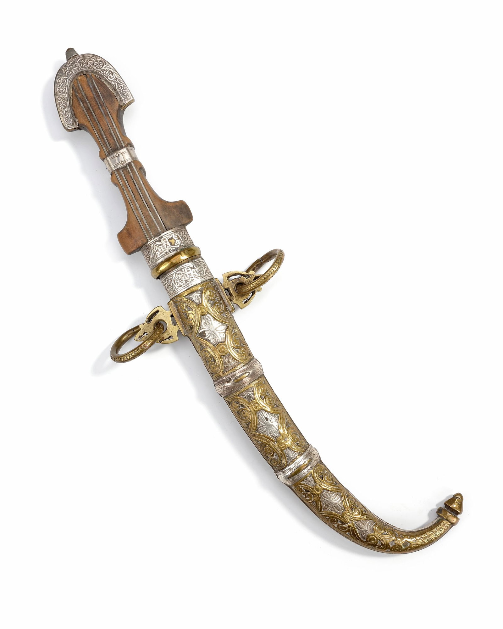 A SILVER DAGGER, MOROCCO, 19TH CENTURY: With a curved blade, wooden hilt, and scabbard richly decorated in silver and gilt designs. 42 cm. 642 gr. THE DR. SAAD AL-JADIR COLLECTION