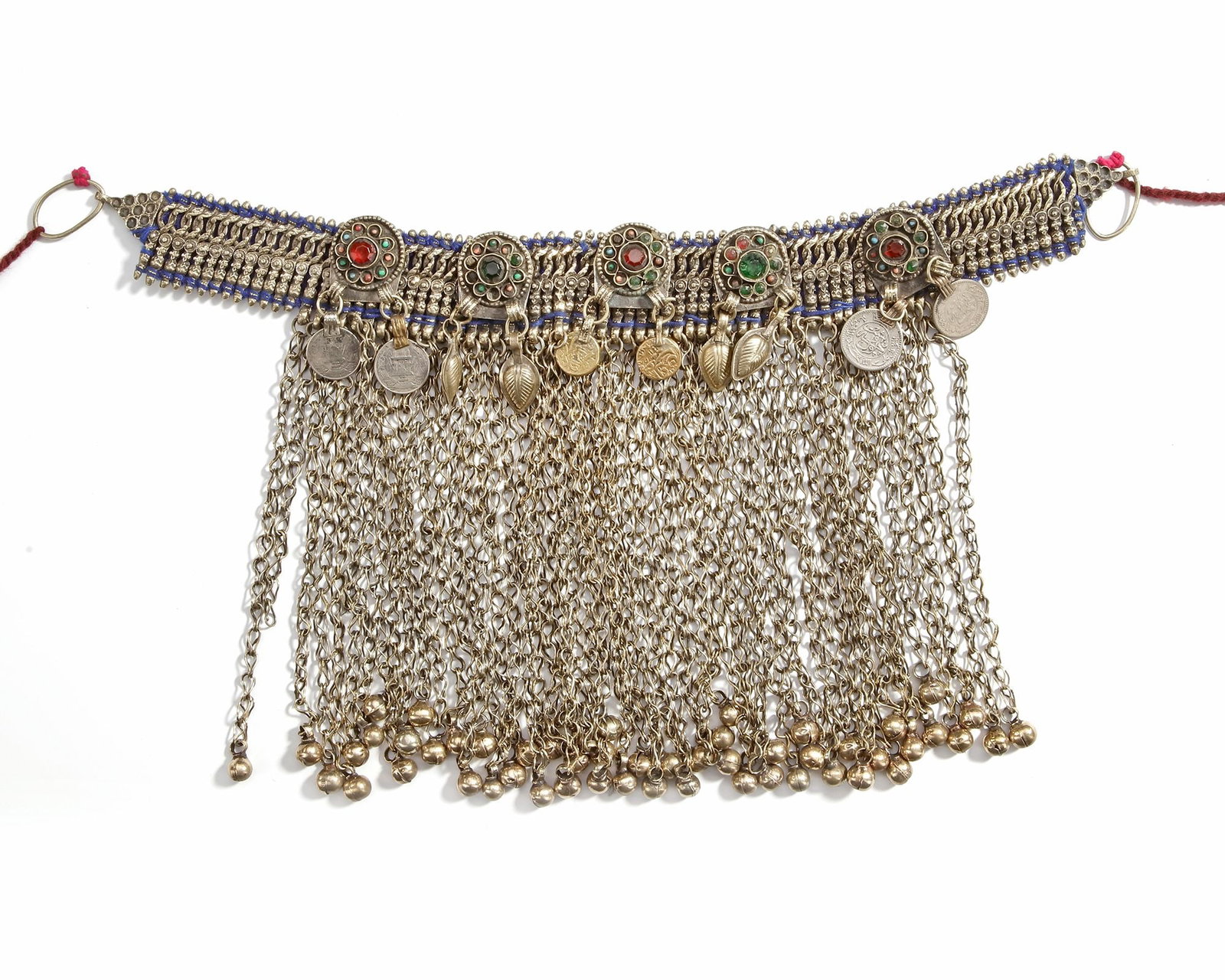 AN AFGHAN SILVER NECKLACE, 19TH CENTURY: With chains, coin pendants, and colorful glass inlays, richly decorated. ca. 34 by 17 cm. 436 gr. THE DR. SAAD AL-JADIR COLLECTION