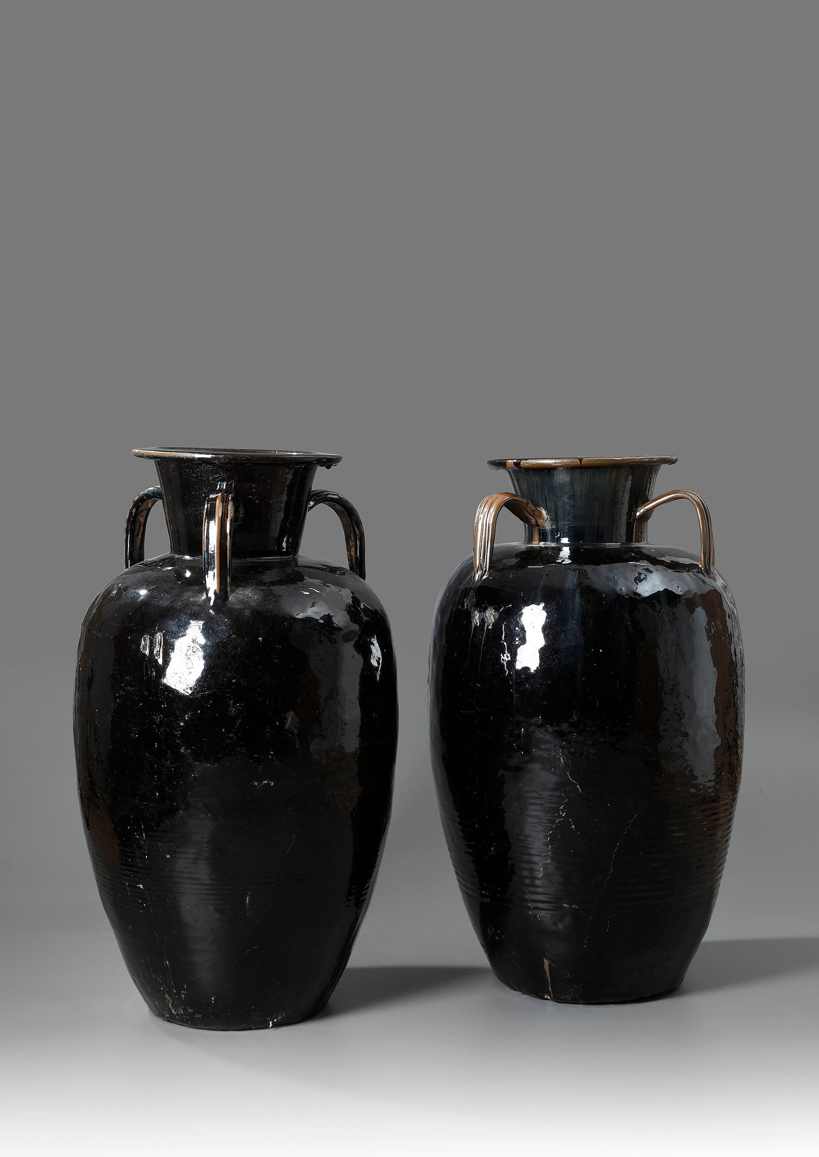 A LARGE PAIR OF CHINESE EARTHENWARE VESSELS, 19TH CENTURY (1 of 2)