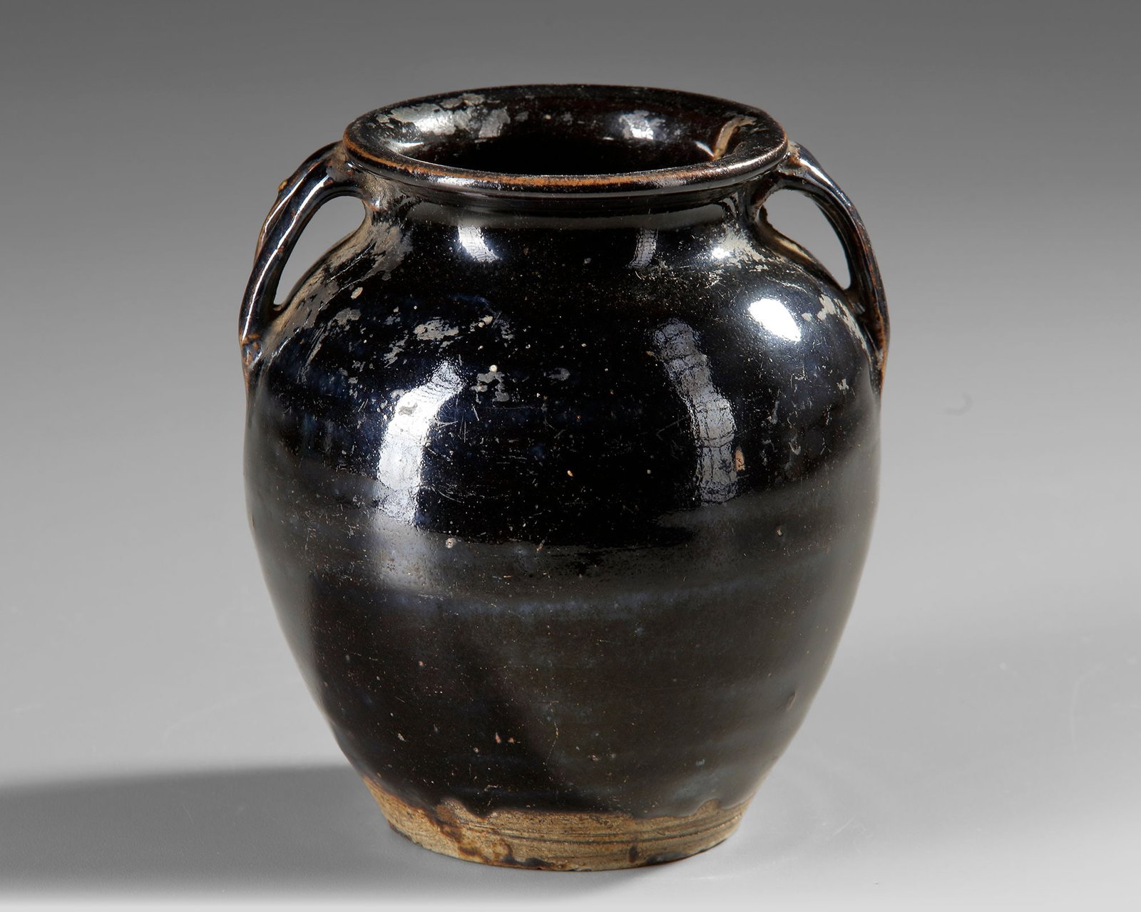 A CHINESE CIZHOU-TYPE BLACK-GLAZED JAR (1 of 4)
