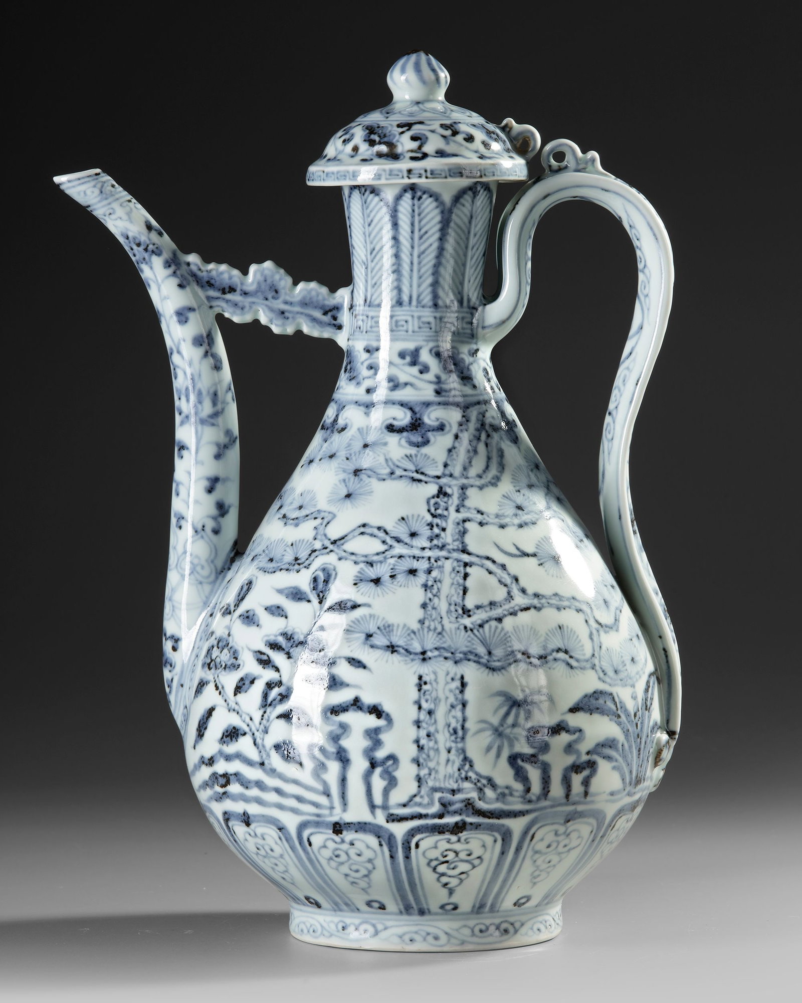 A CHINESE BLUE AND WHITE 'THREE FRIENDS OF WINTER' EWER, QING DYNASTY (1644-1911) (1 of 4)