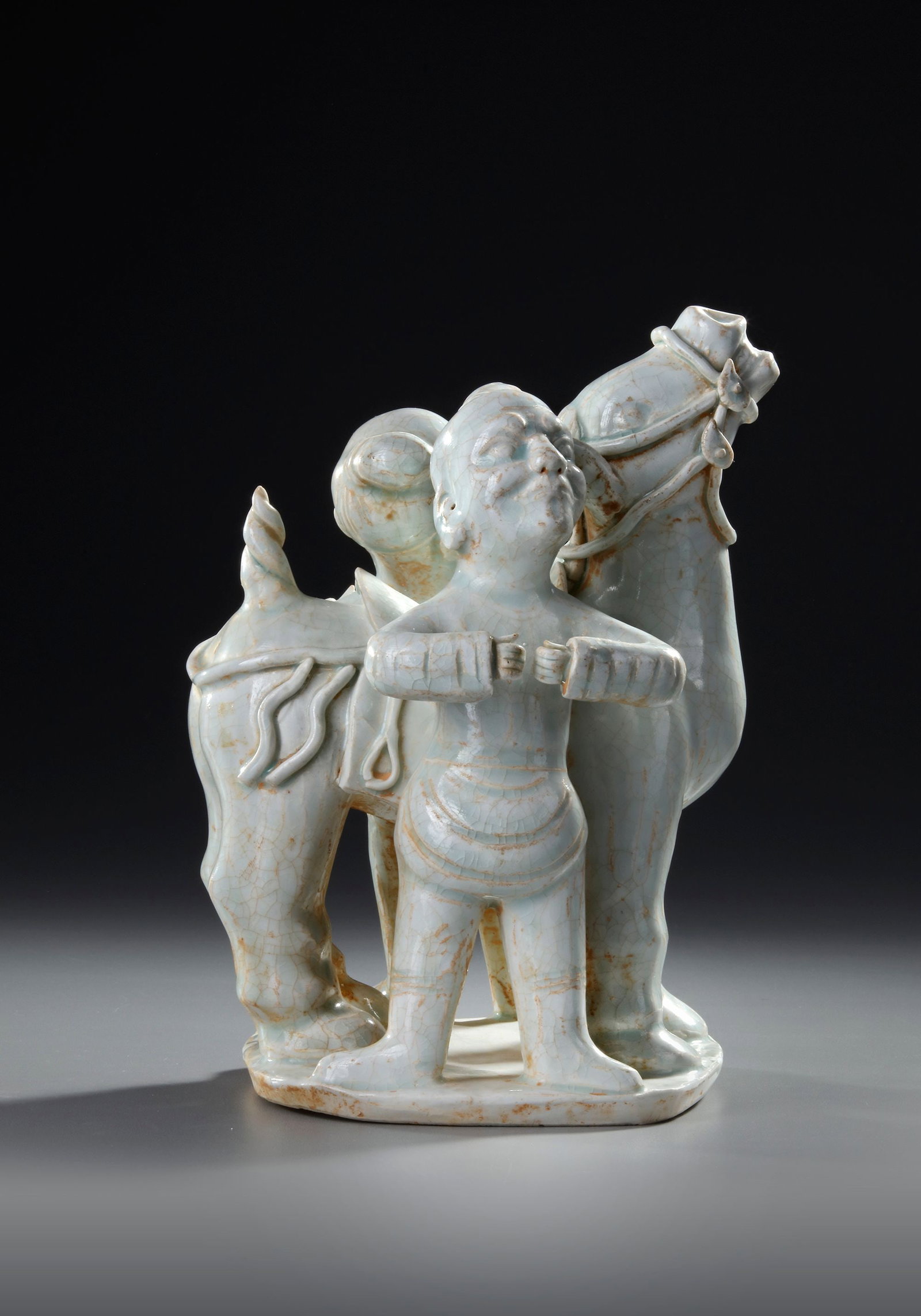 A CHINESE QINGBAI PORCELAIN HORSE WITH GROOMS, NORTHERN SONG DYNASTY (960â€“1127) (1 of 5)