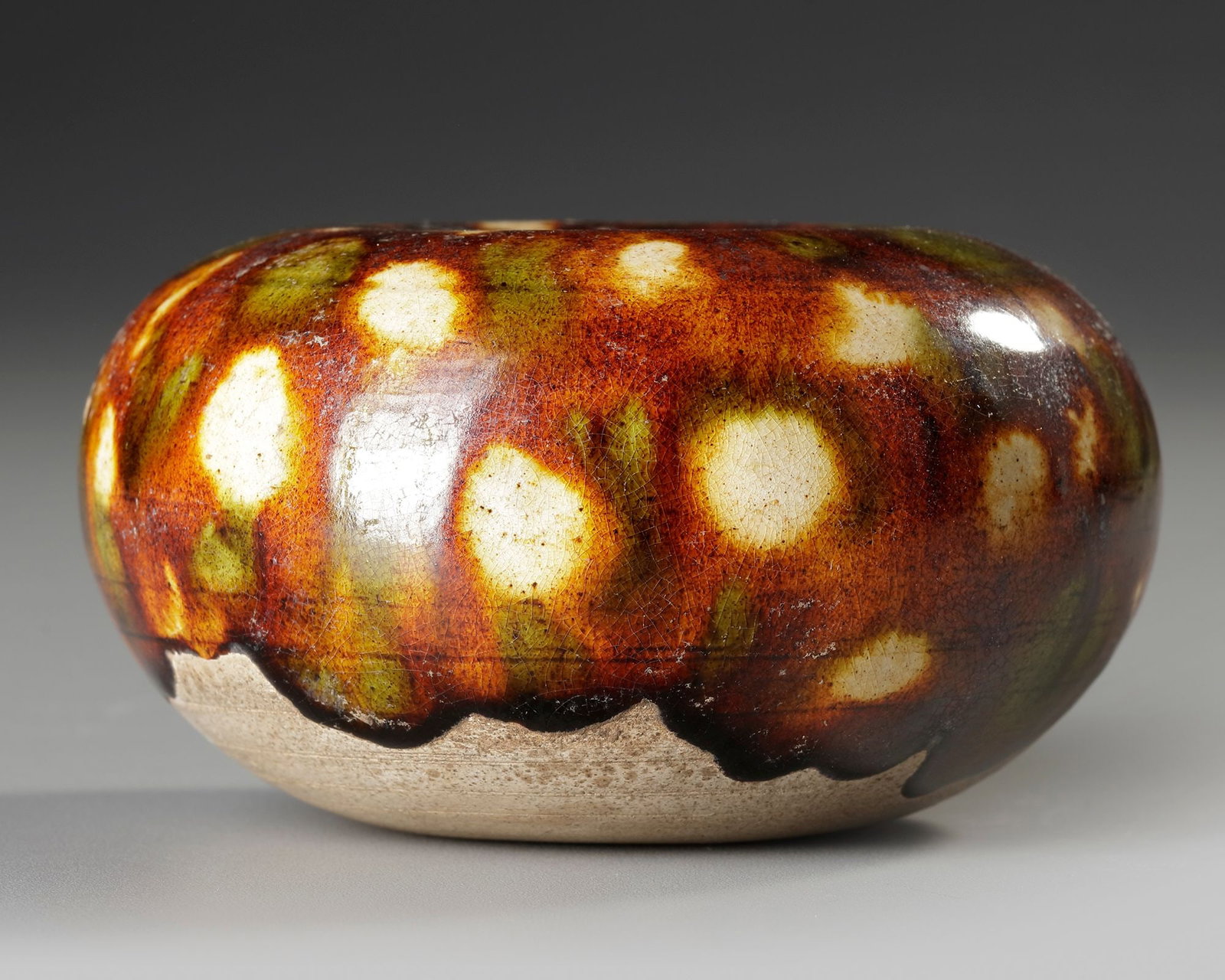 A CHINESE SANCAI GLAZED WATERPOT, TANG DYNASTY (618-907) (1 of 4)