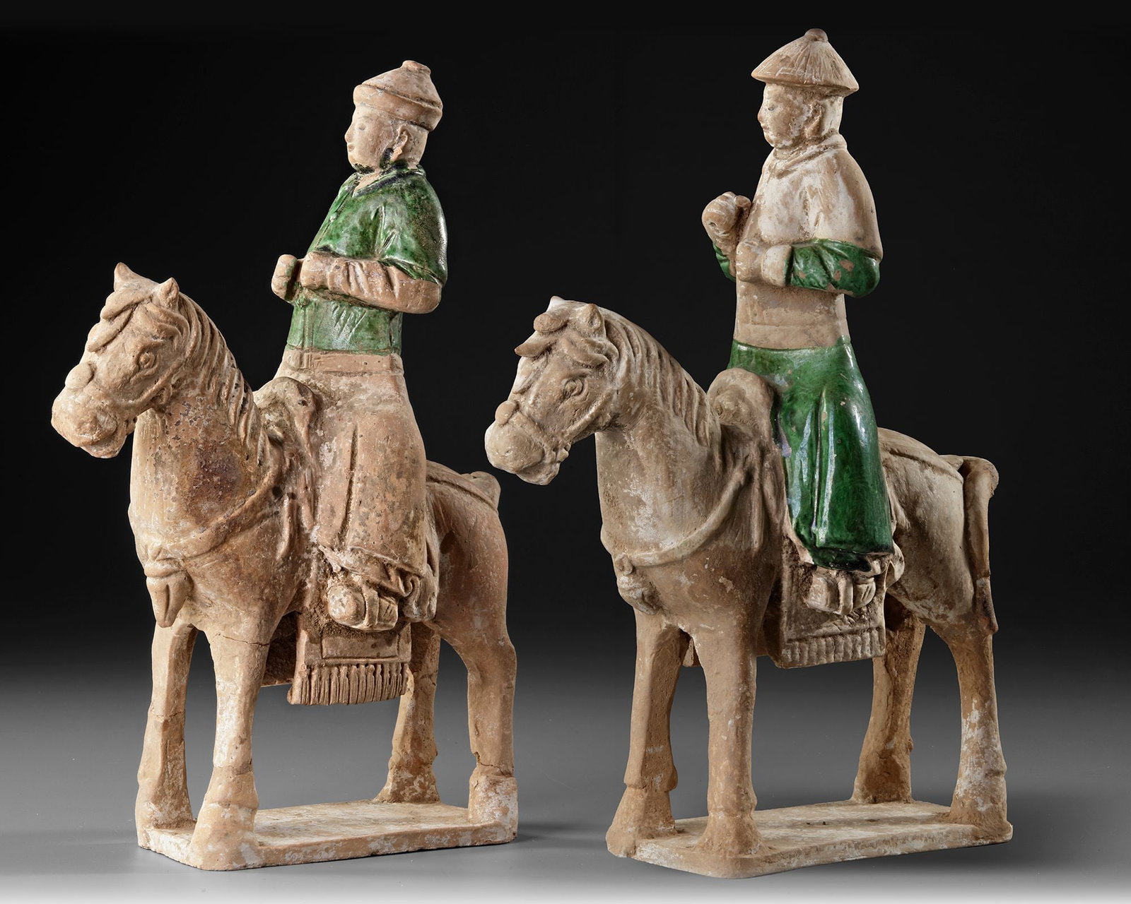 A PAIR OF RIDERS ON HORSES, MING DYNASTY (1368-1644): ca. 37 by 27 cm. Provenance: Private collection, The Netherlands.