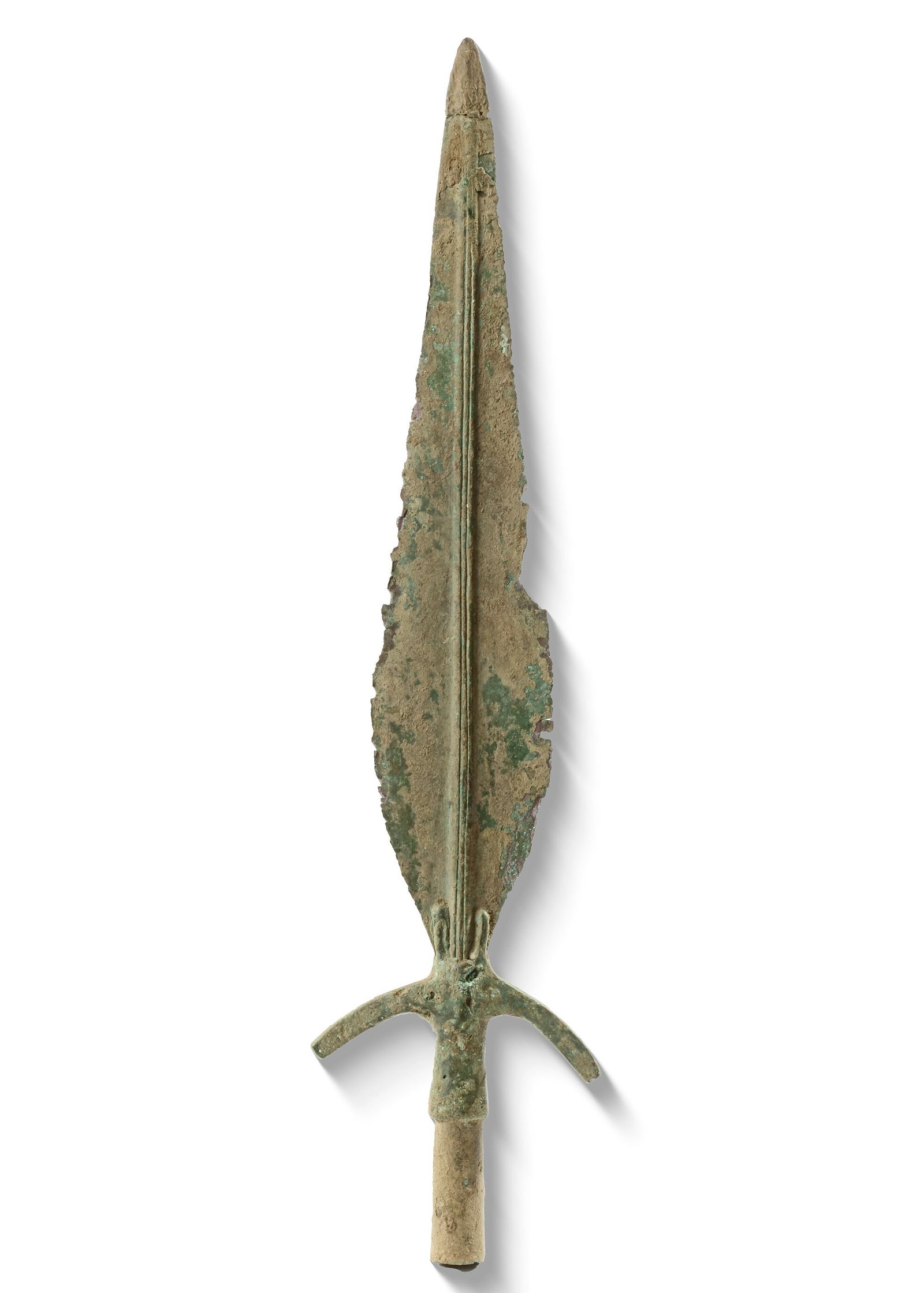 A BRONZE LEAF SHAPED SPEAR HEAD, 3RD-2ND CENTURY BC: Length 51 cm. PROVENANCE Private collection, Germany before 1990