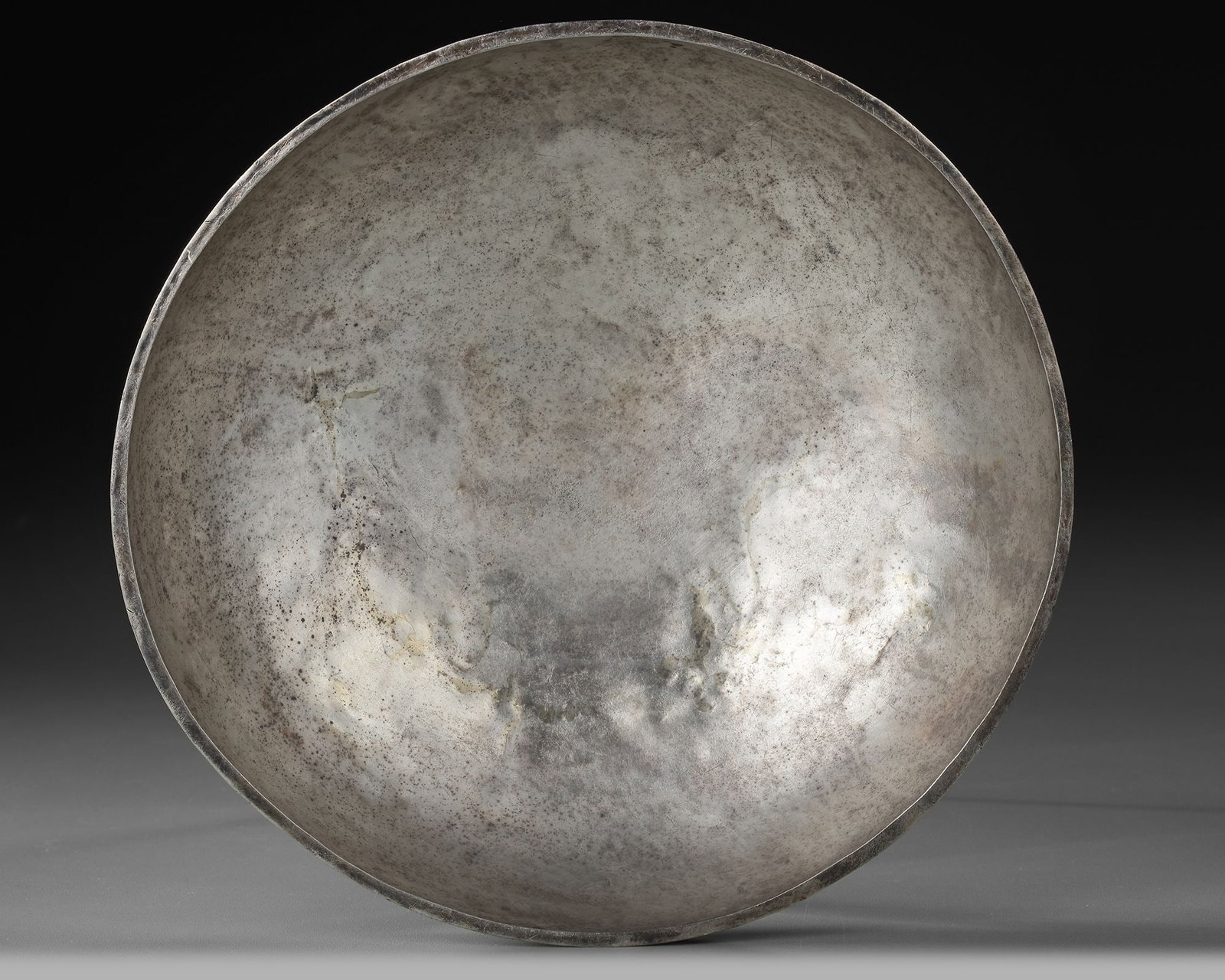A SILVER FIALA, GREECE, 4TH CENTURY BC: Diameter 20 cm. Height 5 cm. PROVENANCE Ex. German collection, since 2013 on the Dutch market