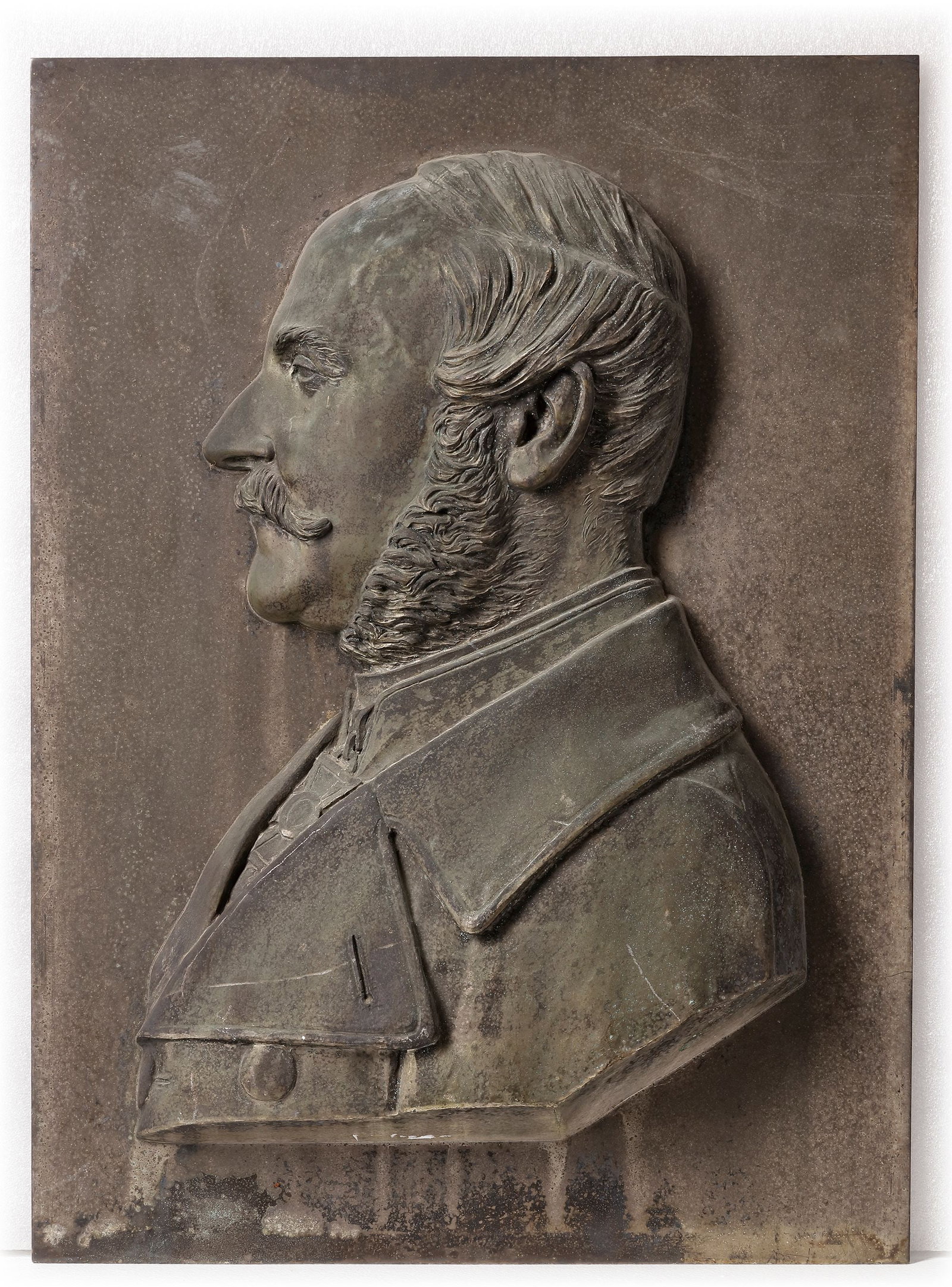 A METAL HIGH-RELIEF PLATE OF KING GEORGE V (GEORGE FRIEDRICH KARL ERNST AUGUST, KING OF HANOVER): Remains of silver plating. 60 by 44 cm. Provenance: Sale Sothebyâ€™s Germany: The Royal House of Hanover, oct 5-15/10/2005, lot 5433