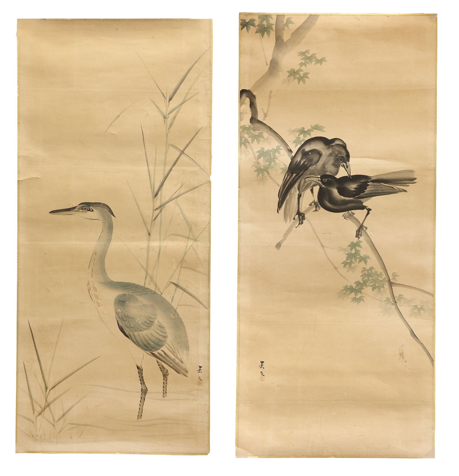 A PAIR OF JAPANESE BIRD PAINTINGS, 19TH CENTURY: A charming pair of Japanese hanging scroll paintings depicting elegant birds in their natural surroundings. One scroll features a graceful heron standing among reeds, while the other portrays two bird