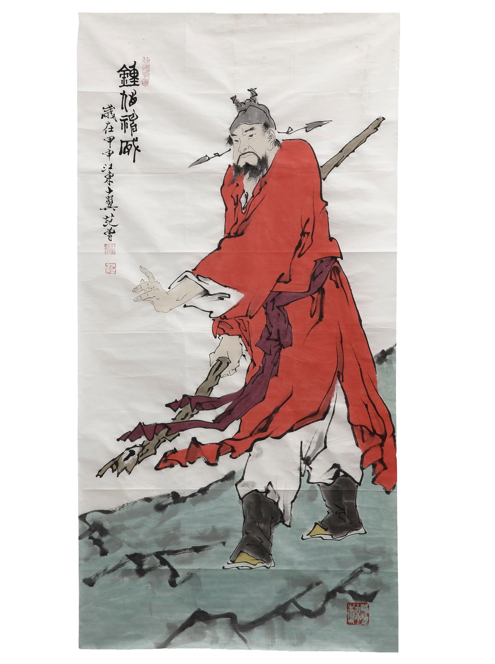 A CHINESE SCHOLAR IN RED ROBES, 20TH CENTURY: A striking Chinese painting depicting a revered scholar or immortal figure dressed in flowing red robes. Executed in expressive brushwork with vivid color accents, the artwork captures the wisdom, dig