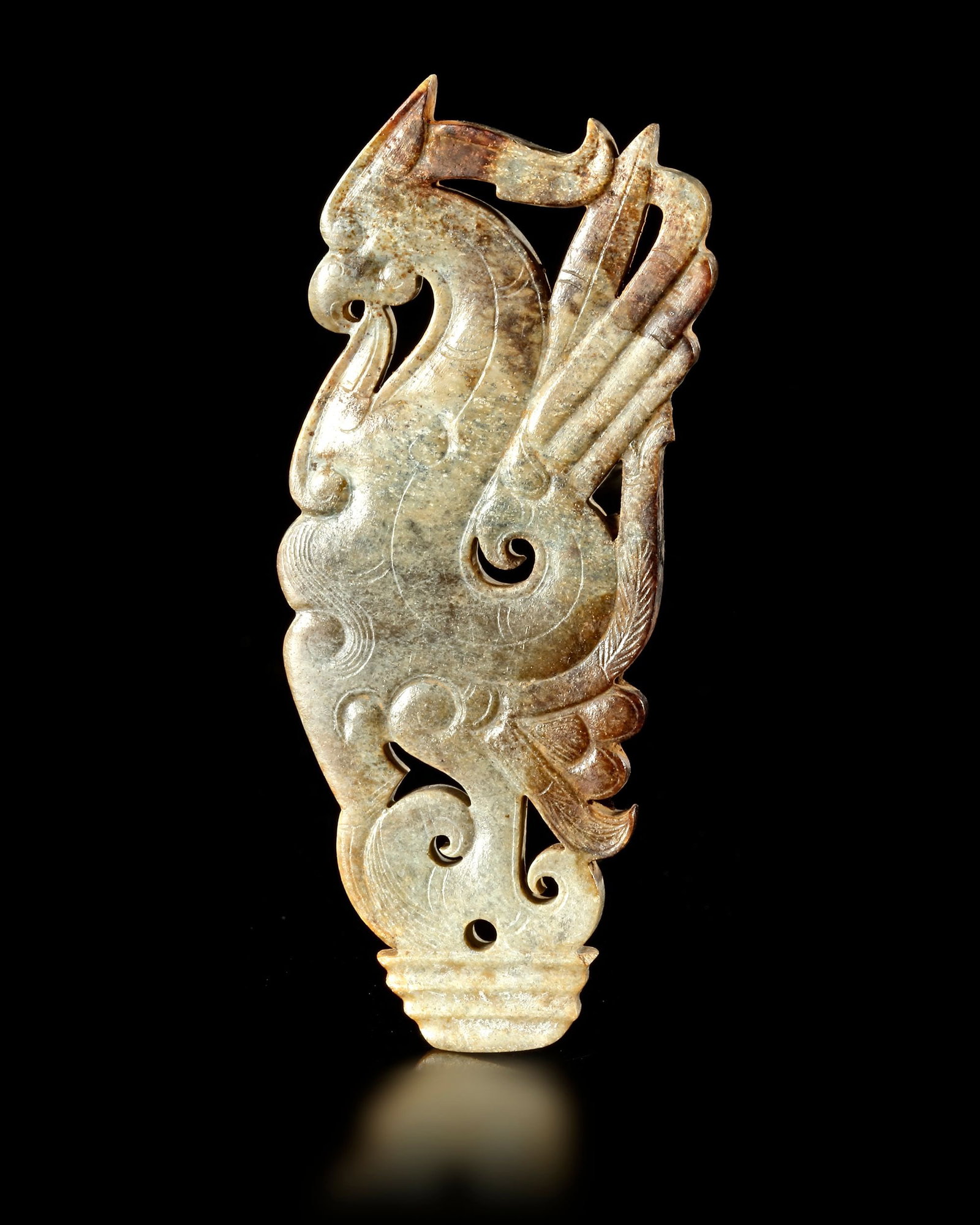A JADE PHOENIX PENDANT, CHINA, HAN DYNASTY (206 BC-220 AD): Height 9 cm. PROVENANCE Purchased in 1996 from Mr. Frank H. Crane, a Canadian antique dealer. His shop, "The Hundred Antiques" was located in Stirling, Ontario, Canada.