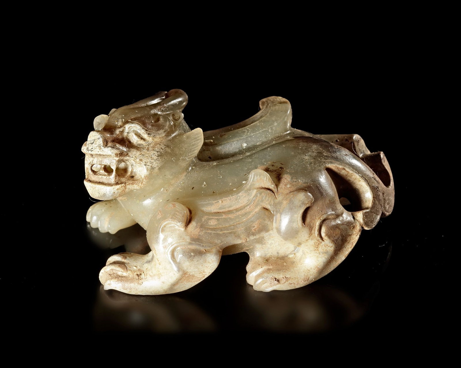 A WHITE JADE CARVING OF PIXIE, CHINA, HAN DYNASTY (206 BC-220 AD) (1 of 5)