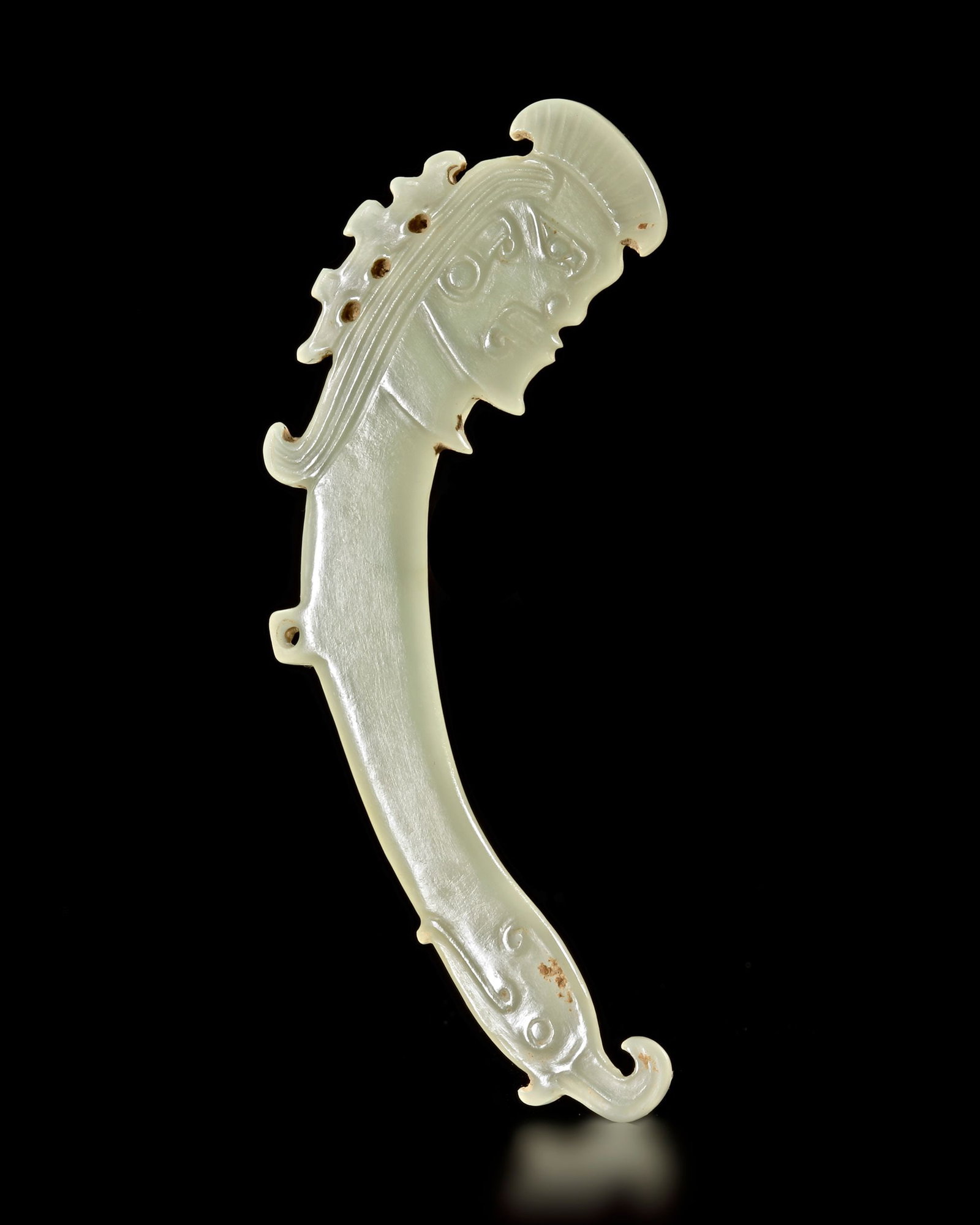 A LIGHT CELADON COLOR JADE OF AN 'ANCESTRAL MASK' PENDANT, CHINA, POST SHIJIAHE CULTURE (1 of 2)