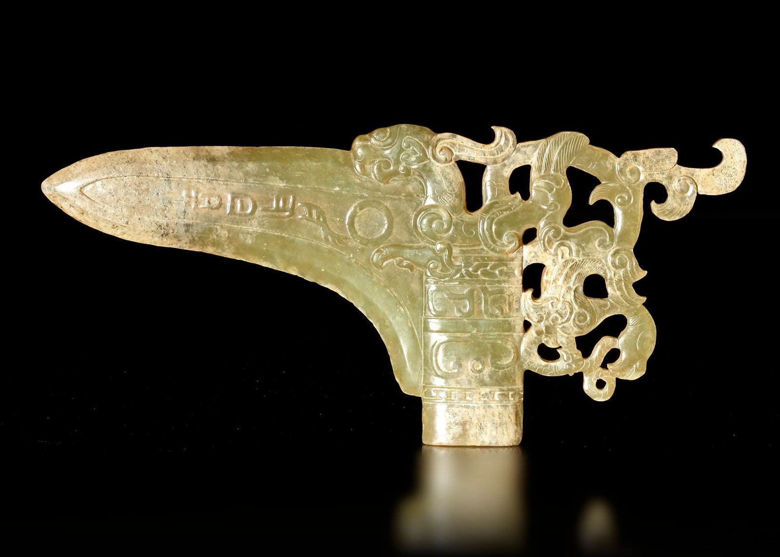 A LIGHT GREEN JADE GE (HALBERD), CHINA, HAN DYNASTY (206 BC-220 AD) (1 of 4)
