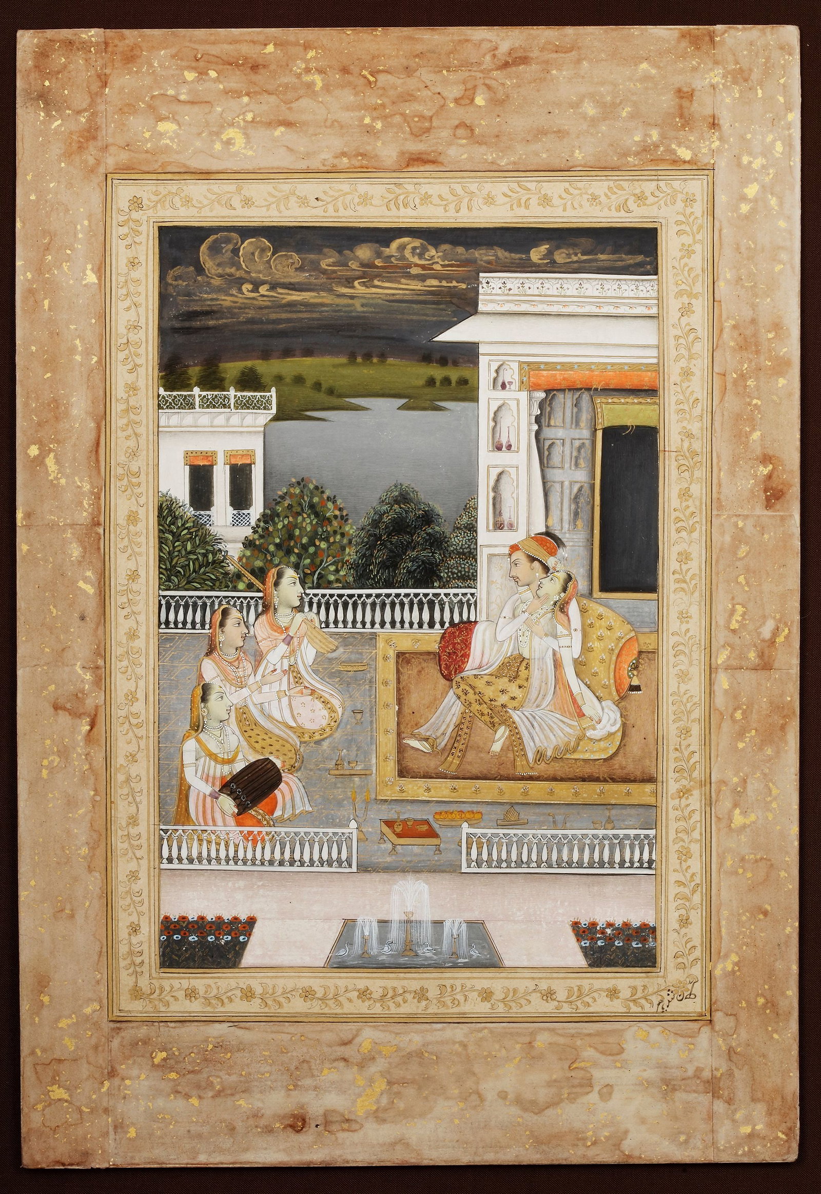 A PRINCE ENTERTAINING HIS MISTRESS WITH MUSICIANS ON A TERRACE, INDIA, 19TH CENTURY (1 of 2)