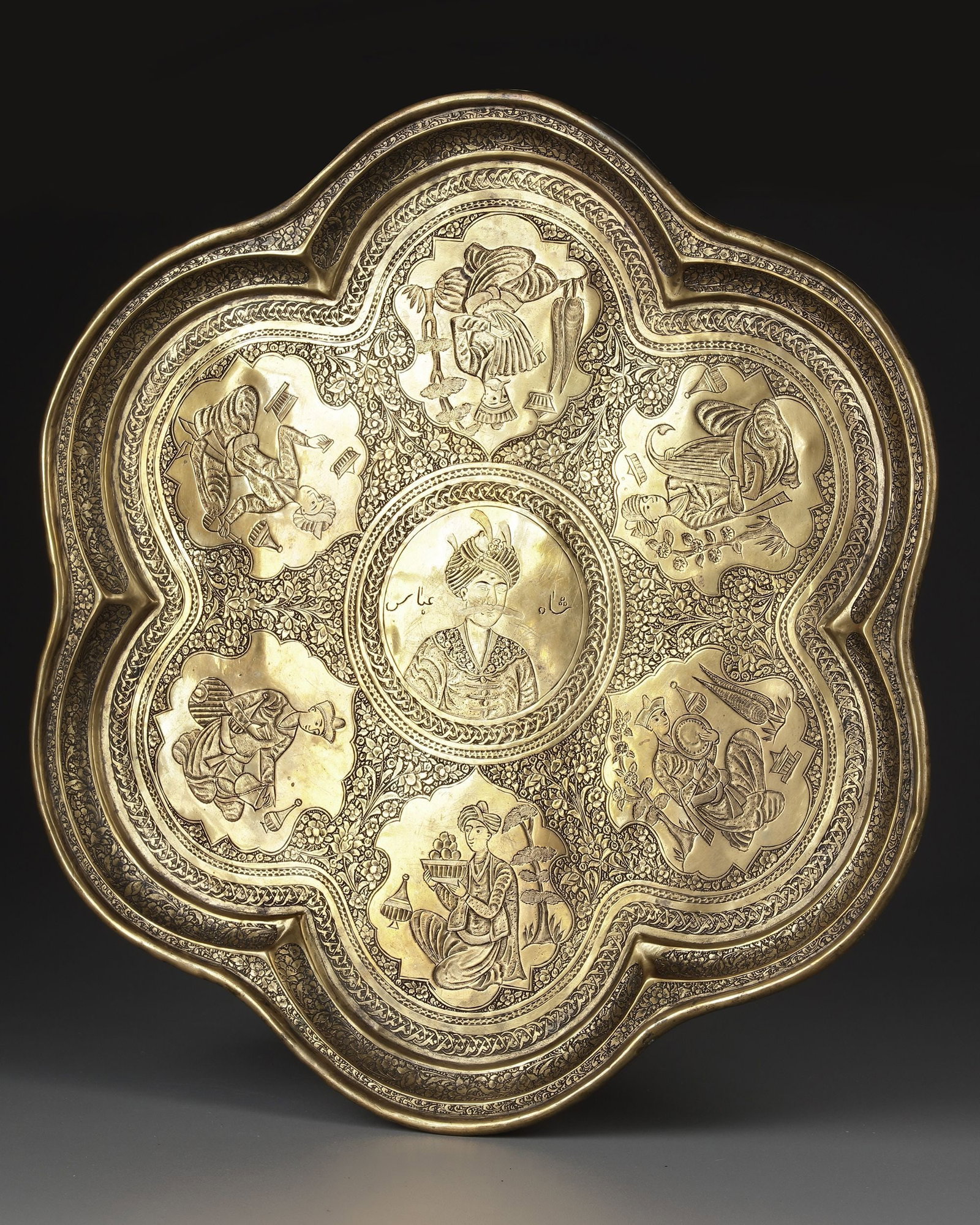 A QAJAR ENGRAVED BRASS TRAY DEPICTING SHAH ABBAS THE GREAT, PERSIA, 19TH CENTURY (1 of 3)