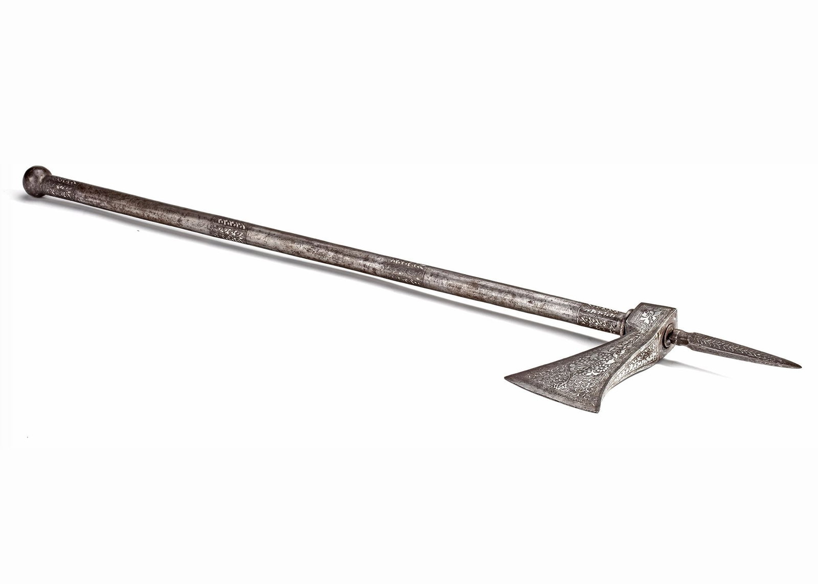 AN INDIAN HORSEMAN'S AXE (TABARZIN), 19TH CENTURY: With iron head with crescentic cutting-edge and squared pean, the upper and lower flats each finely decorated with gold-damascened foliage. 74 by 14 cm.