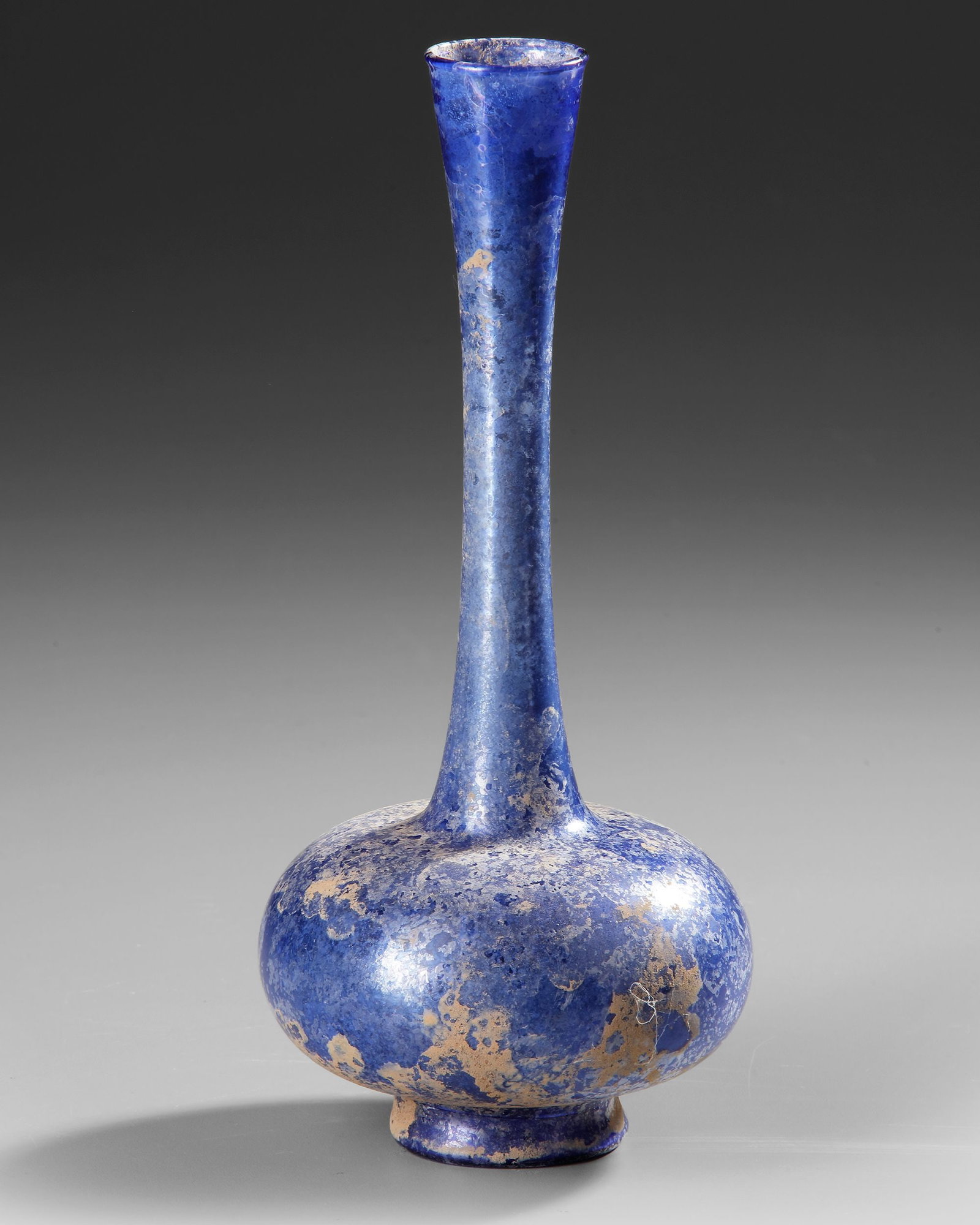 A COBALT BLUE GLASS SPRINKLER FLASK, 9THâ€“11TH CENTURY (1 of 4)
