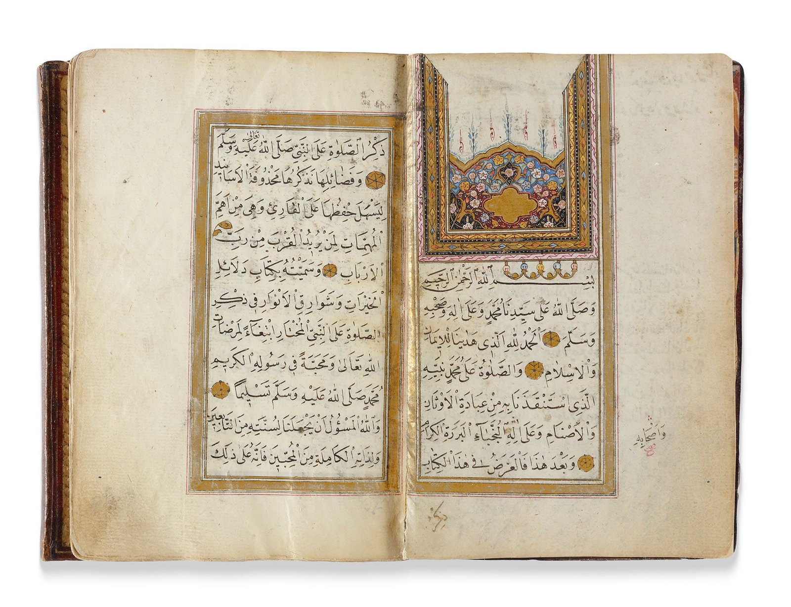 DALA'IL AL-KHAYRAT BY MUHAMMAD BIN SULAYMAN AL-JAZULI (D. 1465 AD), SIGNED UBEYDULLAH ZEHNI, OTTOMAN: Arabic manuscript on paper depicting prayers in honour of the Prophet Muhammad, each folio with 11 lines written in elegant black naskh script, with gold verse markers outlined in black and pointed ou