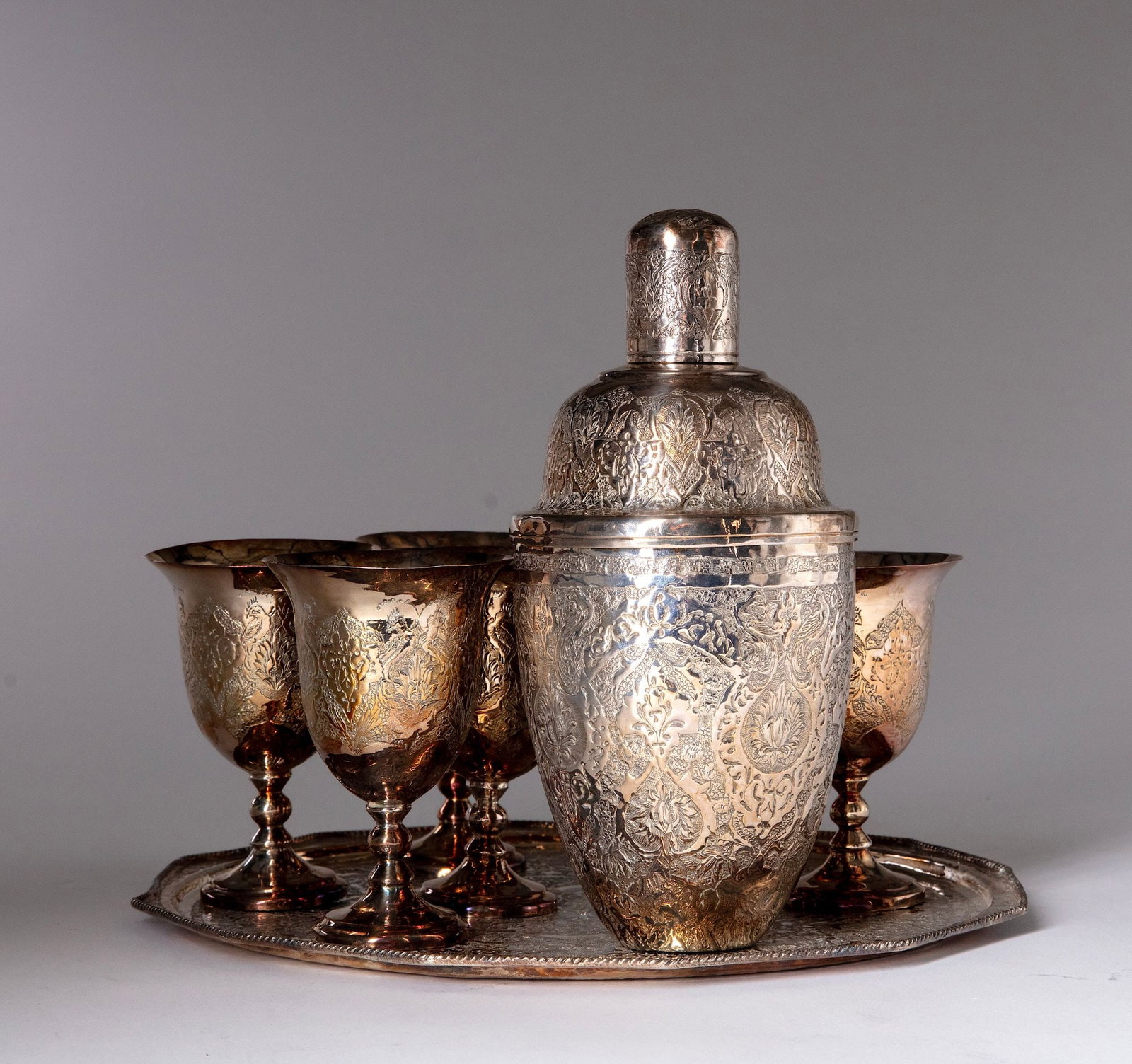 A PERSIAN SILVERPLATED COCKTAIL SET, 20TH CENTURY (1 of 2)