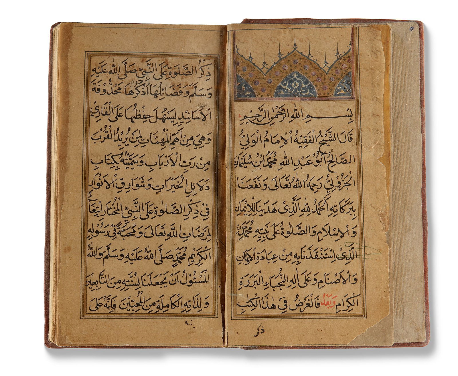 DALA'IL AL-KHAYRAT BY MUHAMMAD BIN SULAYMAN AL-JAZULI (D. 1465 AD), OTTOMAN LATE 18TH/ EARLY 19TH: Arabic devotional manuscript on paper comprising prayers in honour of the Prophet Muhammad, each folio arranged in 11 lines of elegant black Naskh script, with selected words highlighted in red and th