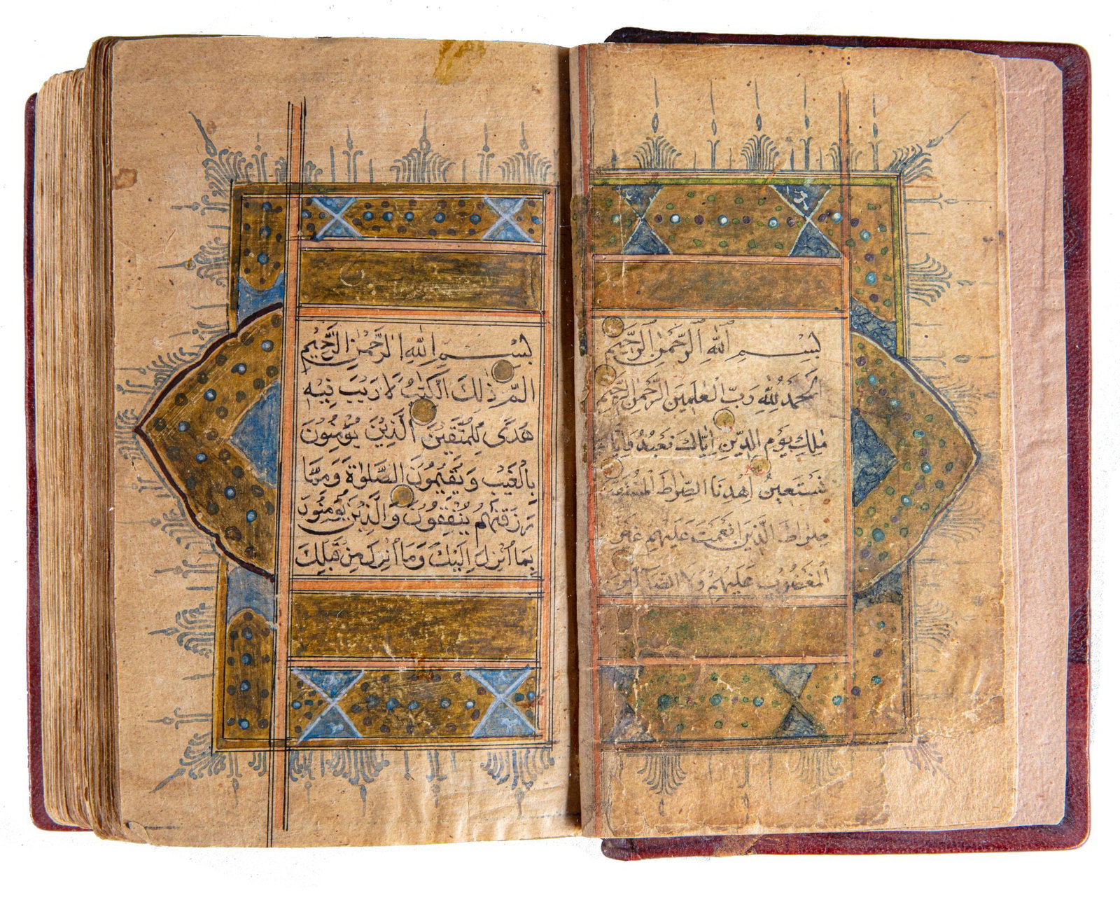 AN ILLUMINATED QURAN, WRITTEN BY MUHAMMAD AMIN AL-NAQSHABANDI, DATED 1150 AH / 1737â€“38 AD: Complete Qurâ€™an, Arabic manuscript on paper, each page arranged in 12 lines of bold black Naskh script, within finely ruled polychrome borders. Surah headings are rendered in red Thuluth, wi
