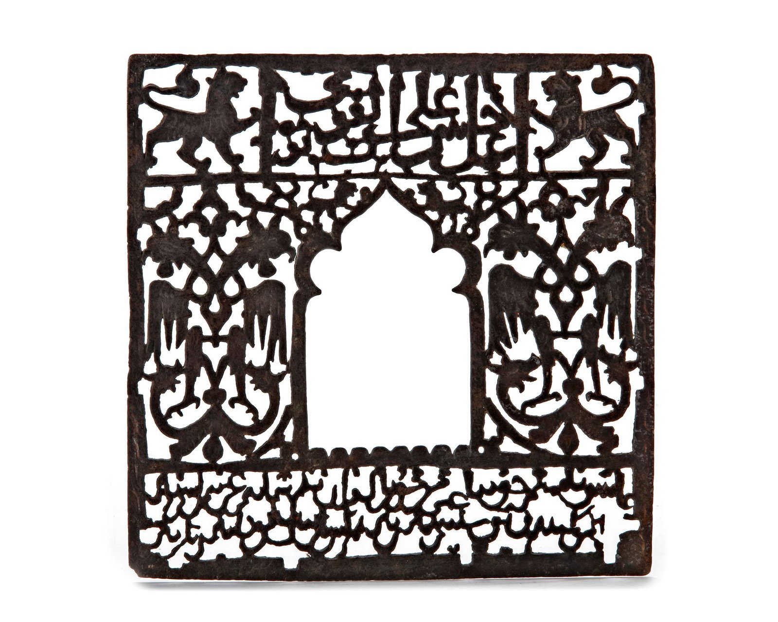A SELJUK PIERCED STEEL GRAVE PANEL, DATED 409 AH/1018 AD (1 of 2)
