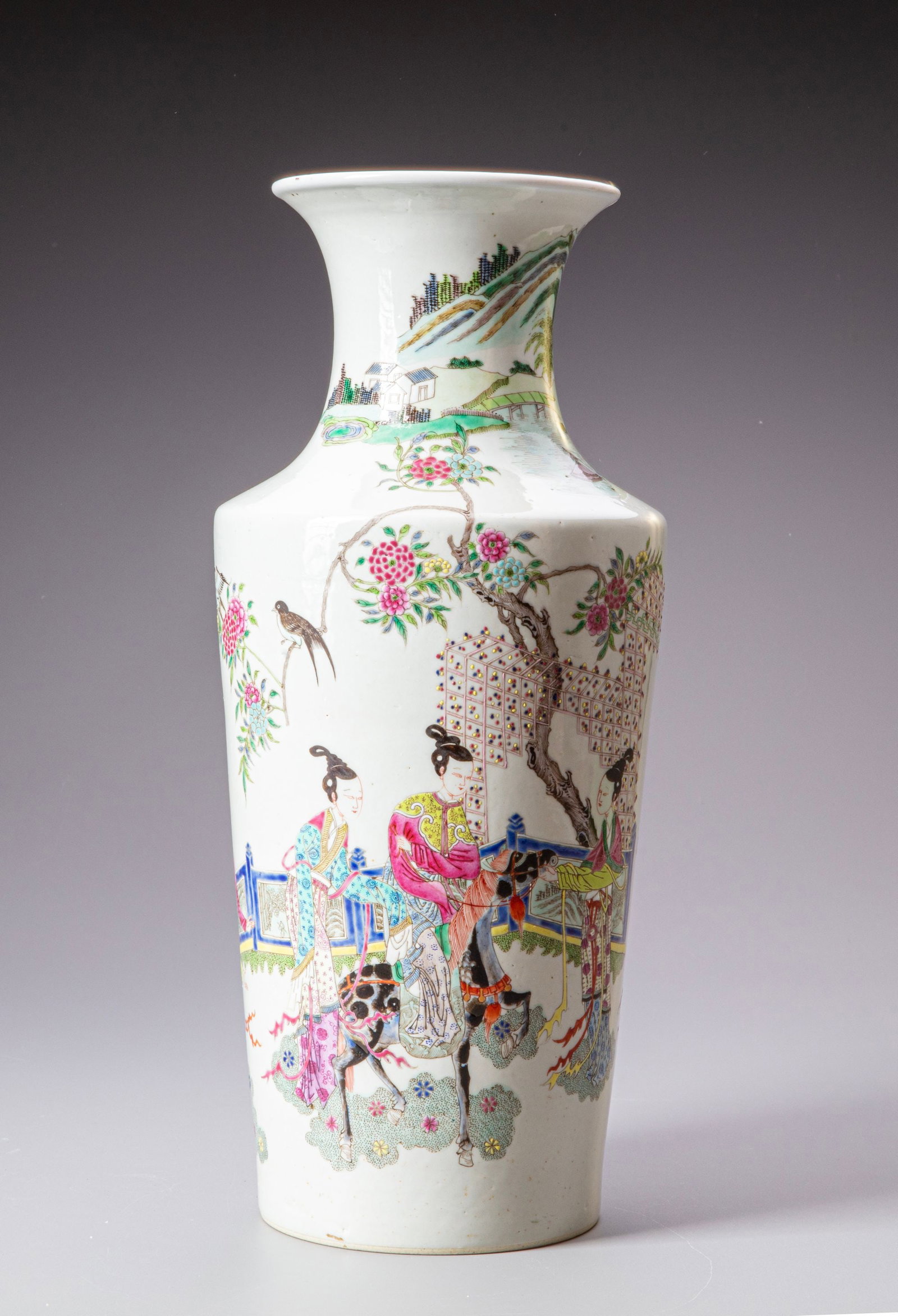 FAMILY ROSE VASE WITH FIGURES, 18TH/ 19TH CENTURY: An elegant Chinese porcelain vase decorated in the Famille Rose palette with finely painted courtly figures, flowering trees, birds, bamboo, and landscape scenes. Its delicate polychrome enamels and d