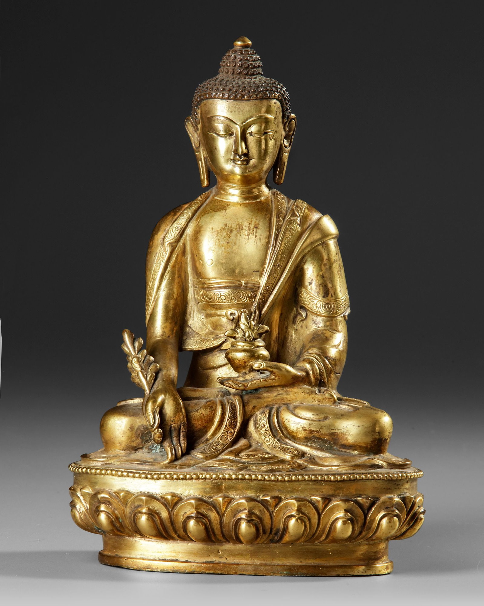 A TIBETAN MEDICINE BUDDHA (BHAISAJYAGURU) GILT BRONZE STATUE, 19TH CENTURY (1 of 6)