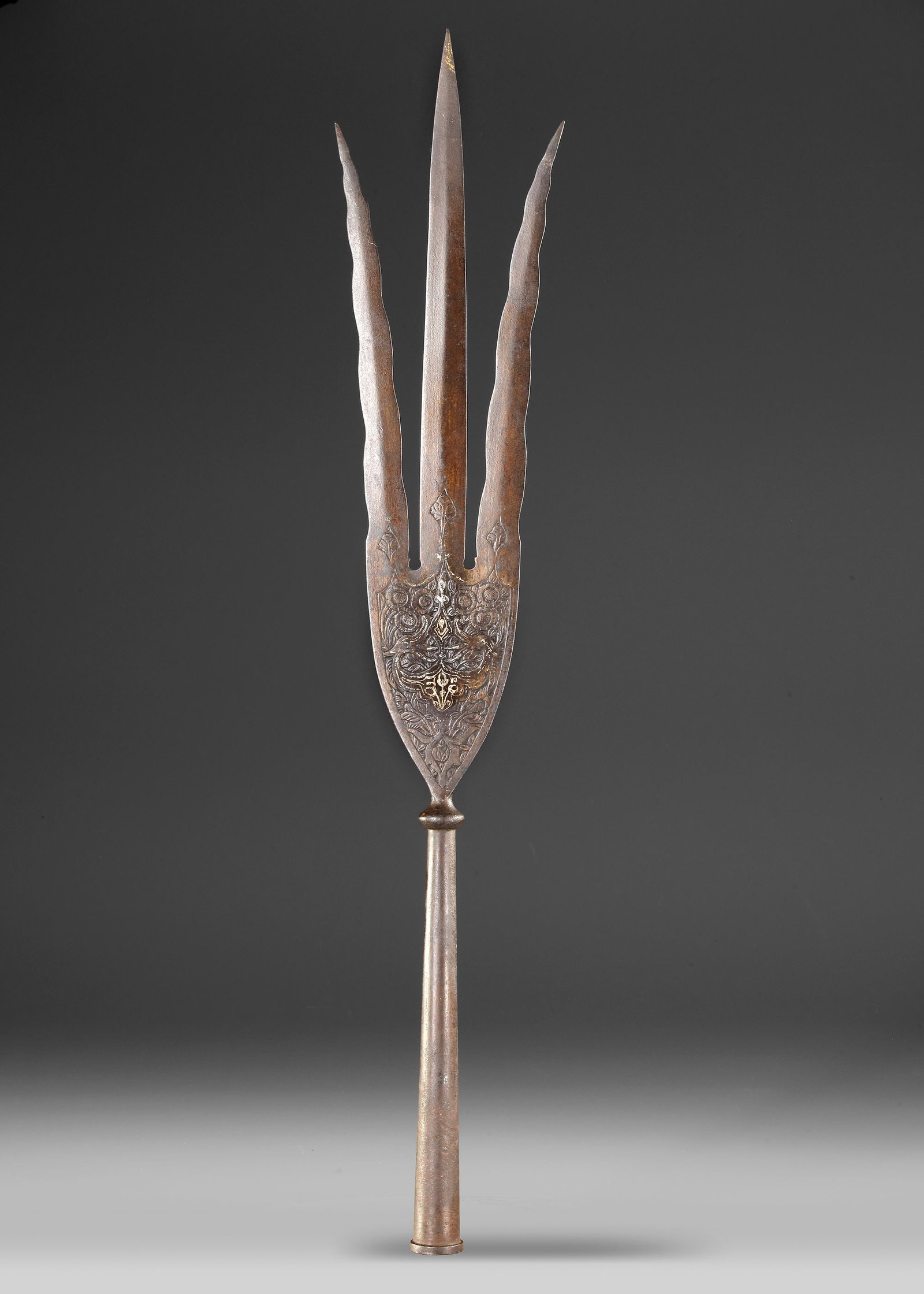 A PERSIAN THREE-PRONGED ??ALAM, ZAND DYNASTY: A finely worked Persian ??Alam' (ceremonial standard finial), of three-pronged form with elongated, tapering blades, the central blade rising above the two lateral blades. The broad lower section is f