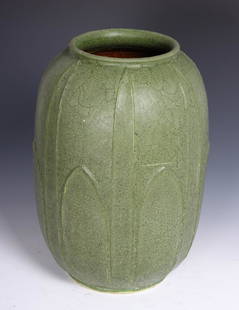 Artist Signed Grueby Matte Green Vessel: A very good large Grueby matte green vessel. Monogrammed AP by the artist. Stylized leaf decoration. Early 20th C. Size: 11.5 x 7 inches.