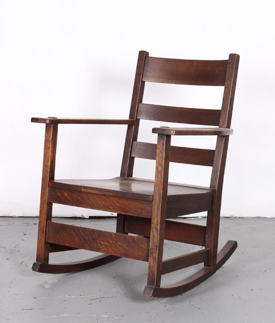 Branded Stickley Arts and Crafts Oak Rocker: Branded Stickley Arts and Crafts Oak Rocker. Size: 32" x 25" x 26".