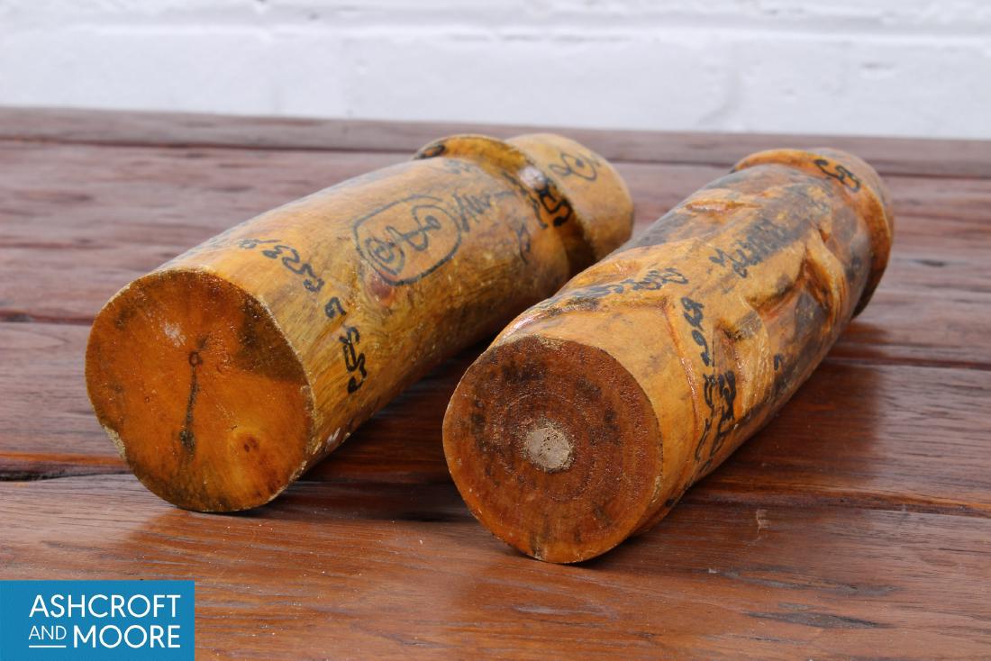 2 Thai Palad Khik Decorated Phallic Amulets: 2 Thai Palad Khik Decorated Phallic Amulets. One featuring a relief carved lizard. Carved wood, ink. Size: largest 11" x 2" diameter.