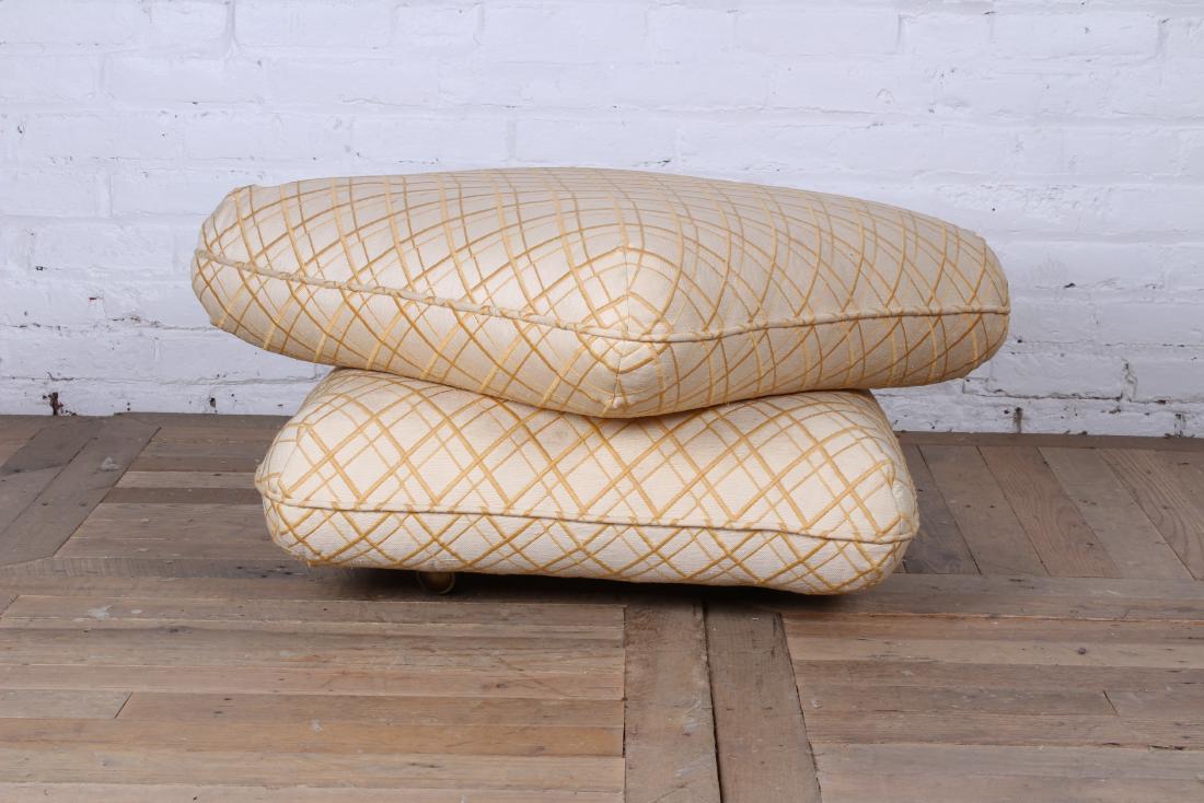 Mid Century Modern David Hicks Style Ottoman: A mid century modern David Hicks style attached cushion ottoman raised on casters. Circa 1960. Size: 15" H x 23" W x 23" D