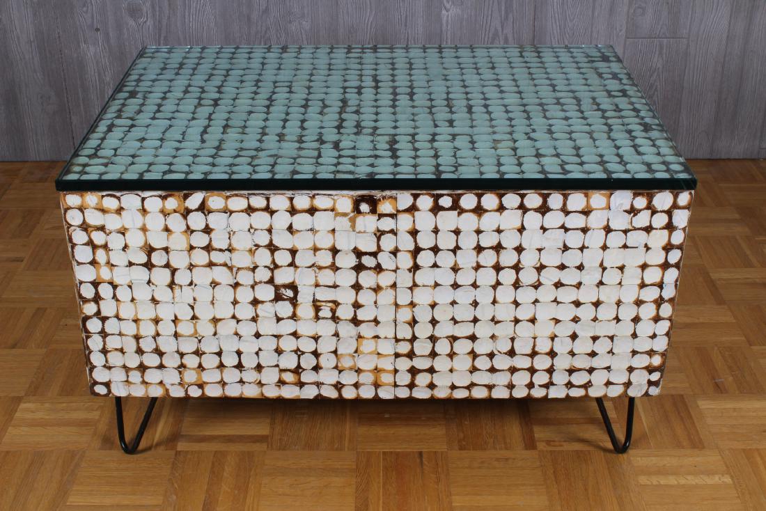 Modern Cubist Form Glass Top Coffee Table: A modern cubist form glass top coffee table with grid pattern wood elements with paint decoration all raised on wrought iron feet. Size: 21" H x 35 1/2" W x 34" D
