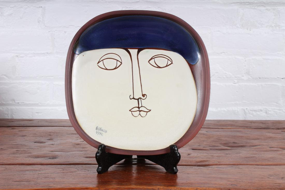 Susana Espinosa Decorated Redware Tray: A labeled Susana Espinosa decorated redware tray with abstract face. Marked "77 PR". 20th century. Size: 11" W x 11" D